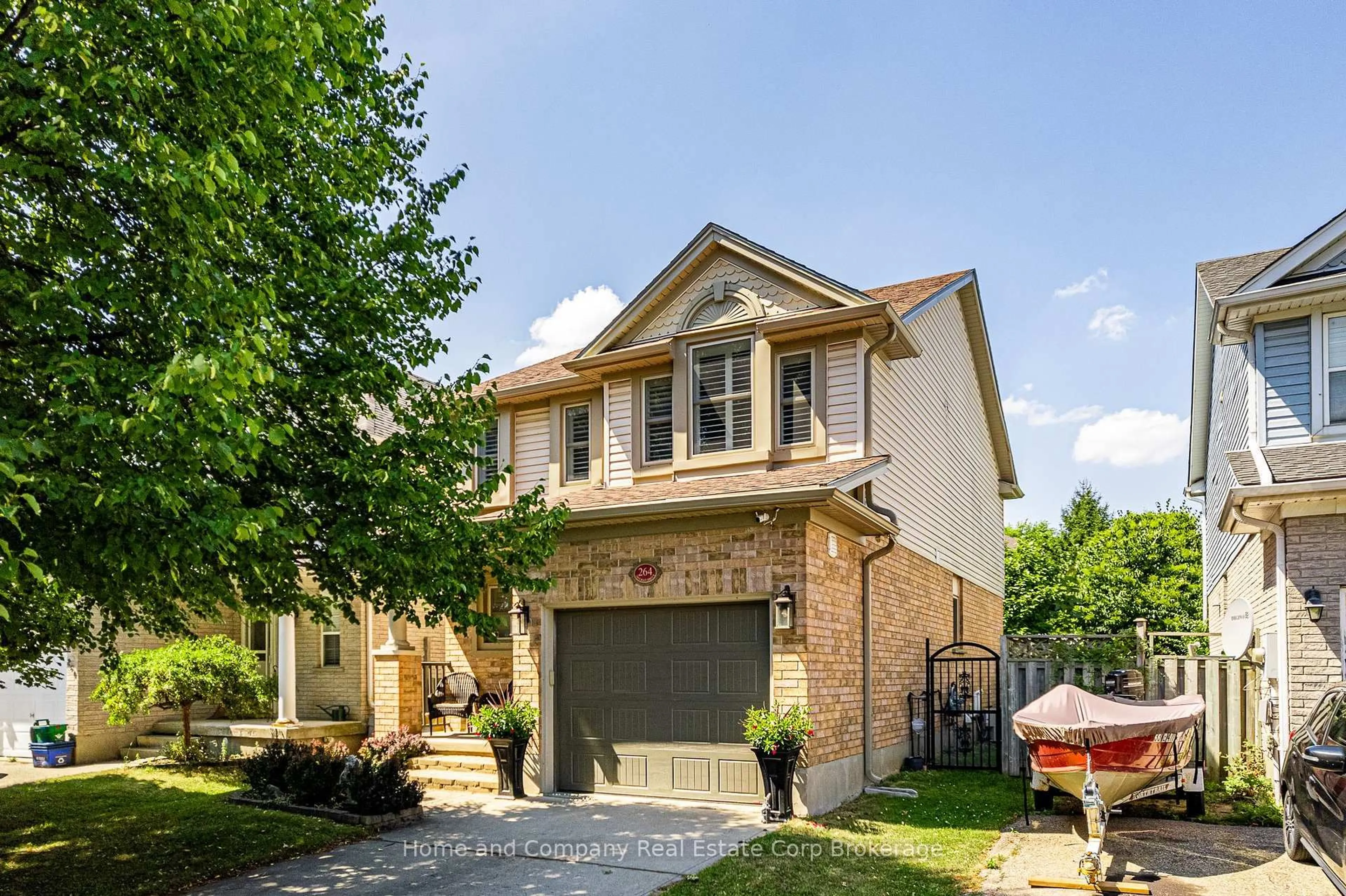 Home with brick exterior material, street for 264 Melran Dr, Cambridge Ontario N3C 4E5