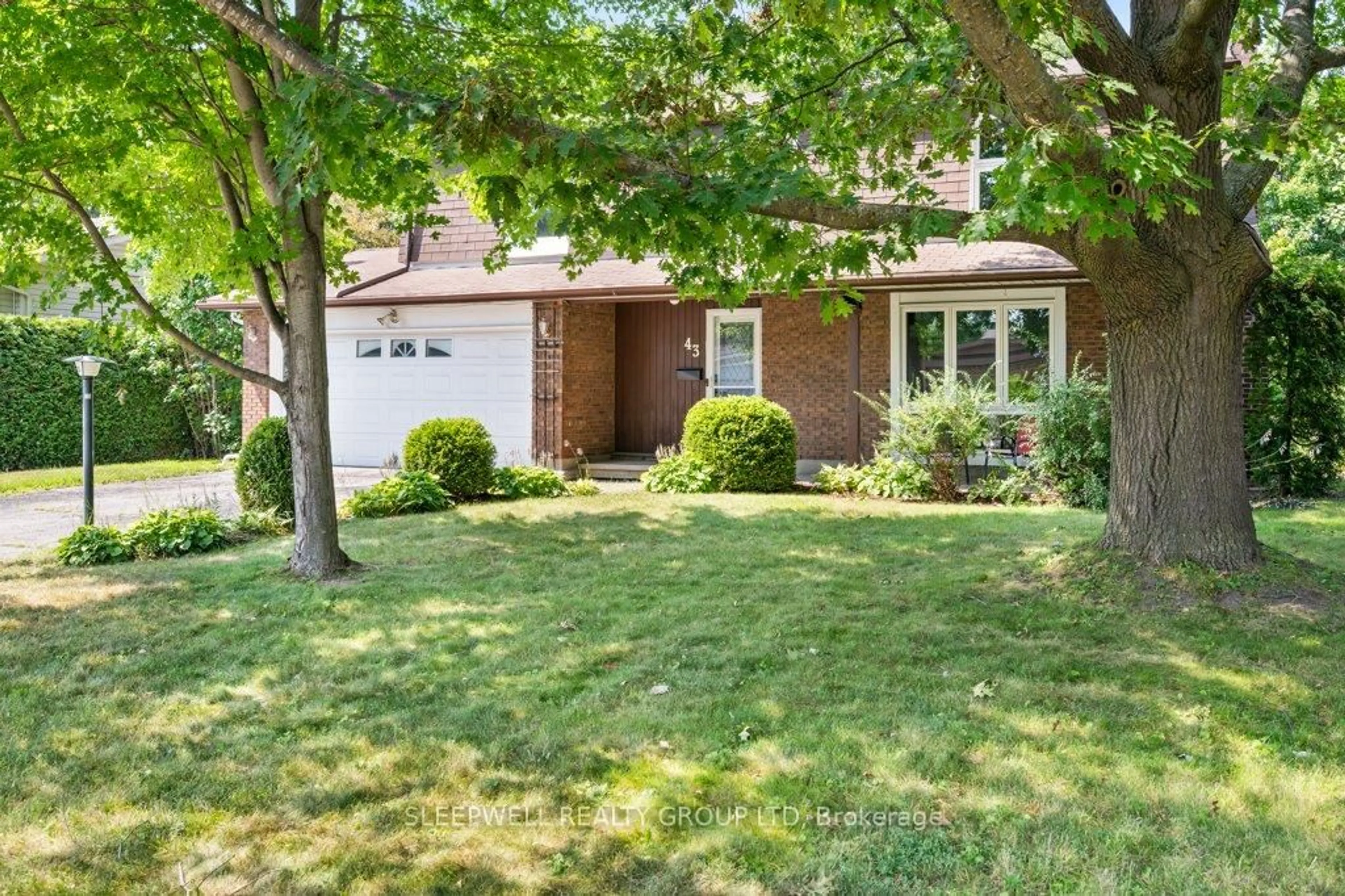 Home with brick exterior material, street for 43 Parkglen Dr, Ottawa Ontario K2G 3G7