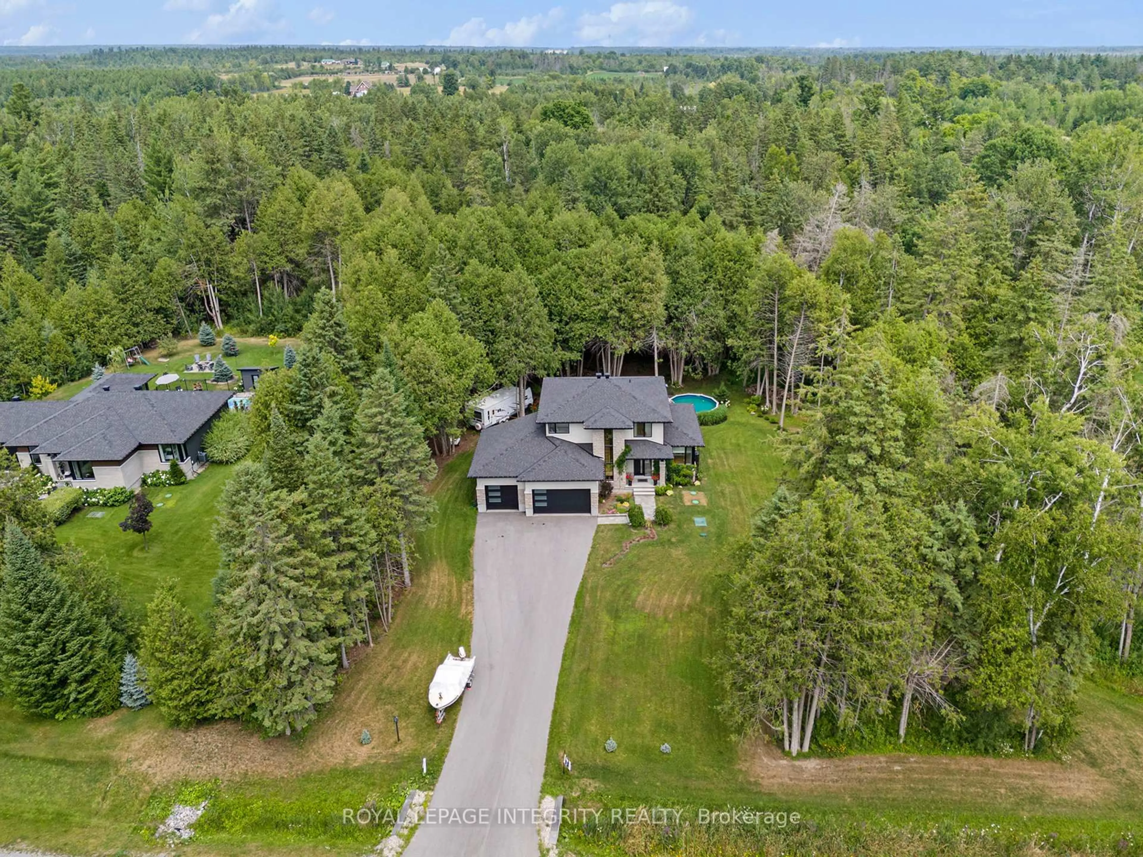 A pic from outside/outdoor area/front of a property/back of a property/a pic from drone, forest/trees view for 309 Ridgemont Dr, Ashton Ontario K0A 1B0