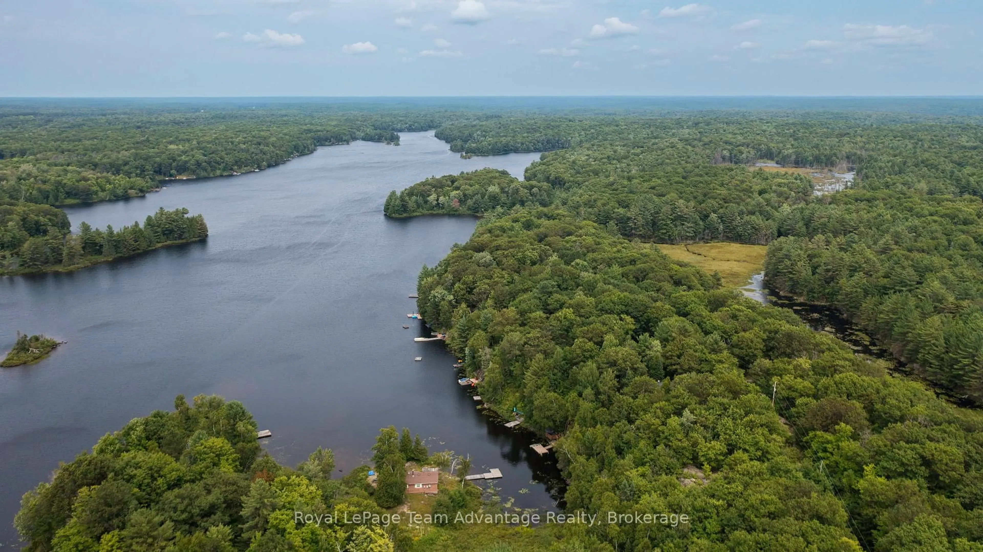 A pic from outside/outdoor area/front of a property/back of a property/a pic from drone, water/lake/river/ocean view for 40 Fairholme Lake Rd, Whitestone Ontario P0A 1G0