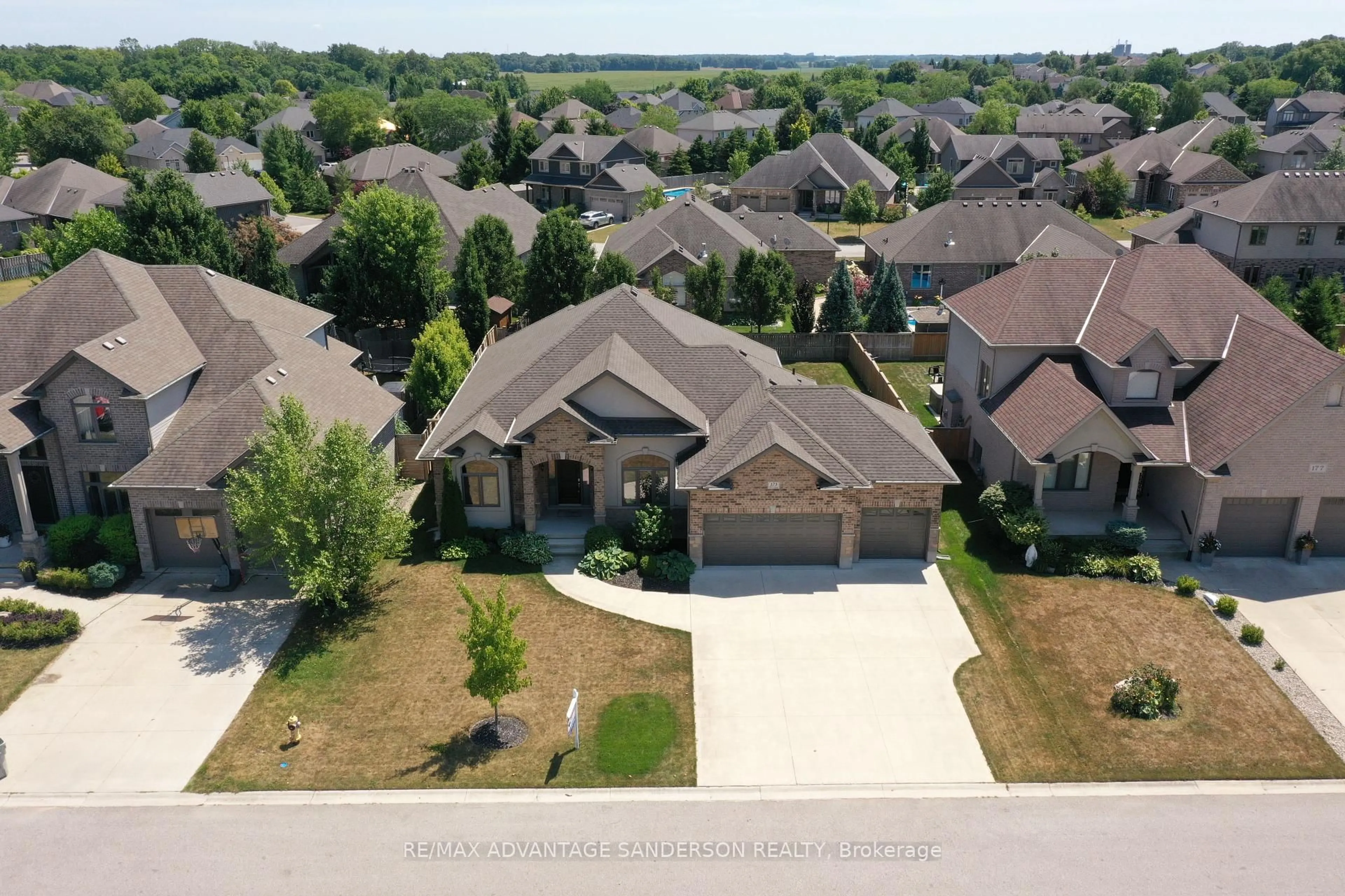 A pic from outside/outdoor area/front of a property/back of a property/a pic from drone, street for 173 Martin Dr, Middlesex Centre Ontario N0M 2A0