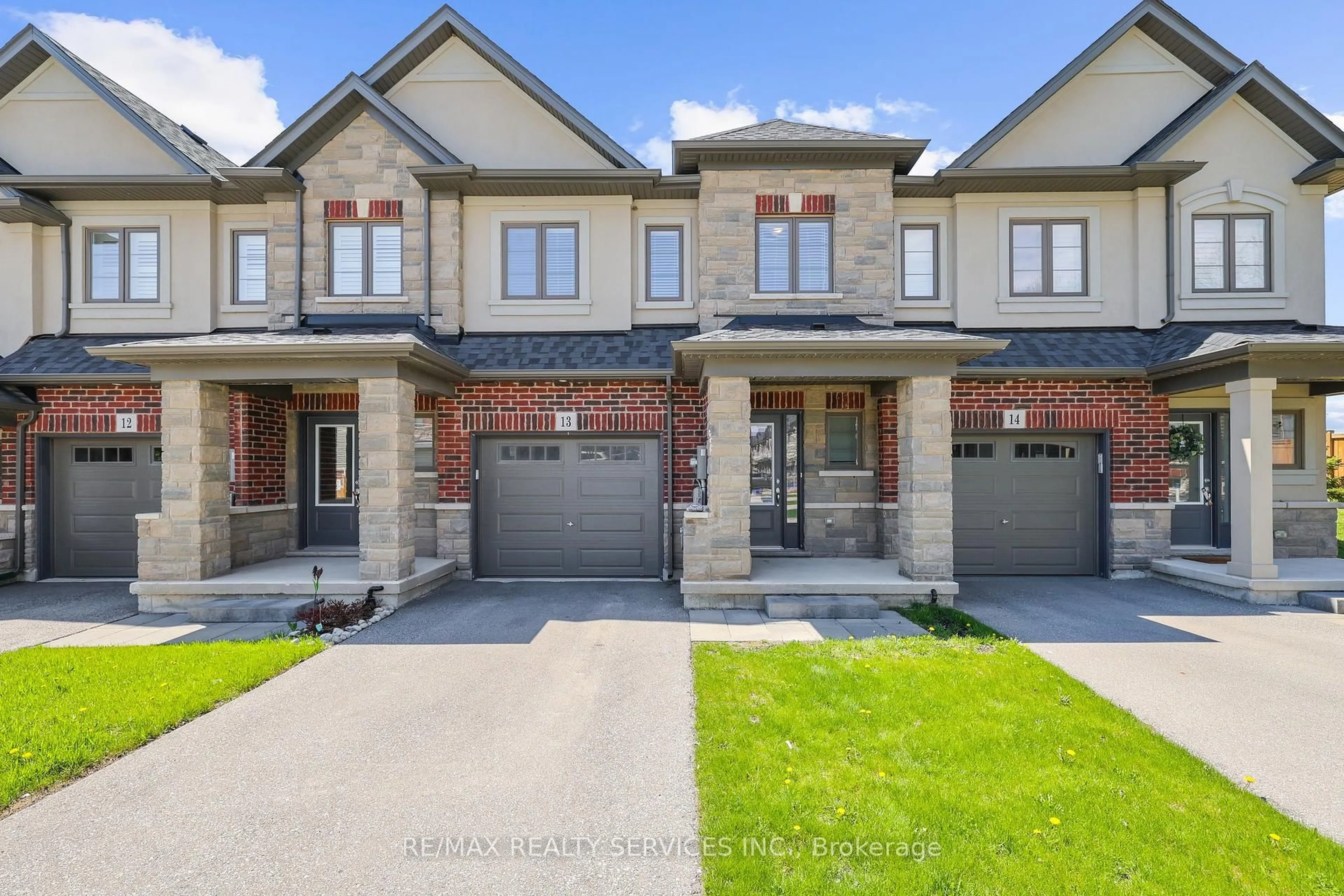 Home with brick exterior material, street for 324 Equestrian Way #13, Cambridge Ontario N3E 0E2