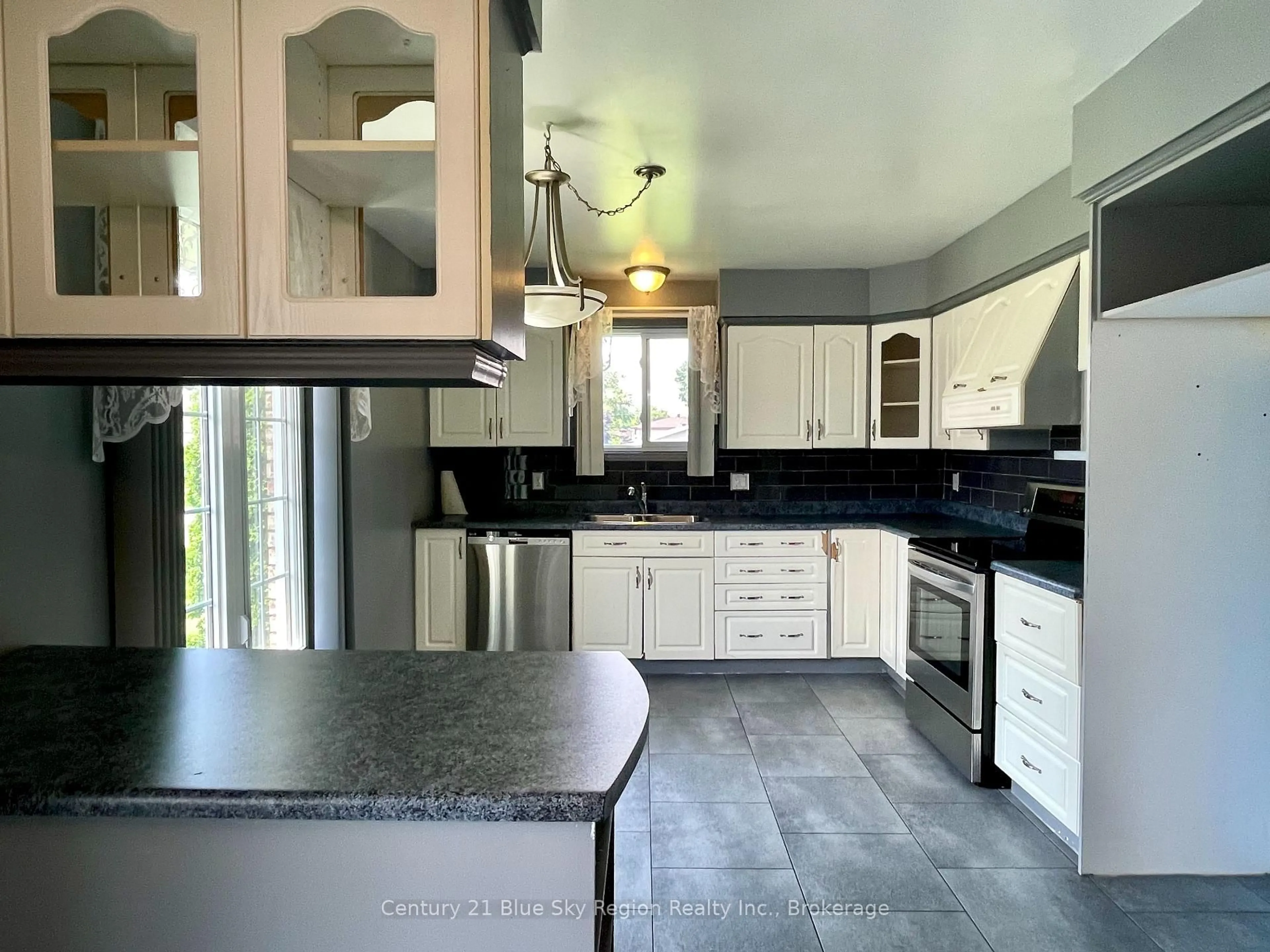Open concept kitchen, ceramic/tile floor for 233 Salter St, West Nipissing Ontario P2B 3B7