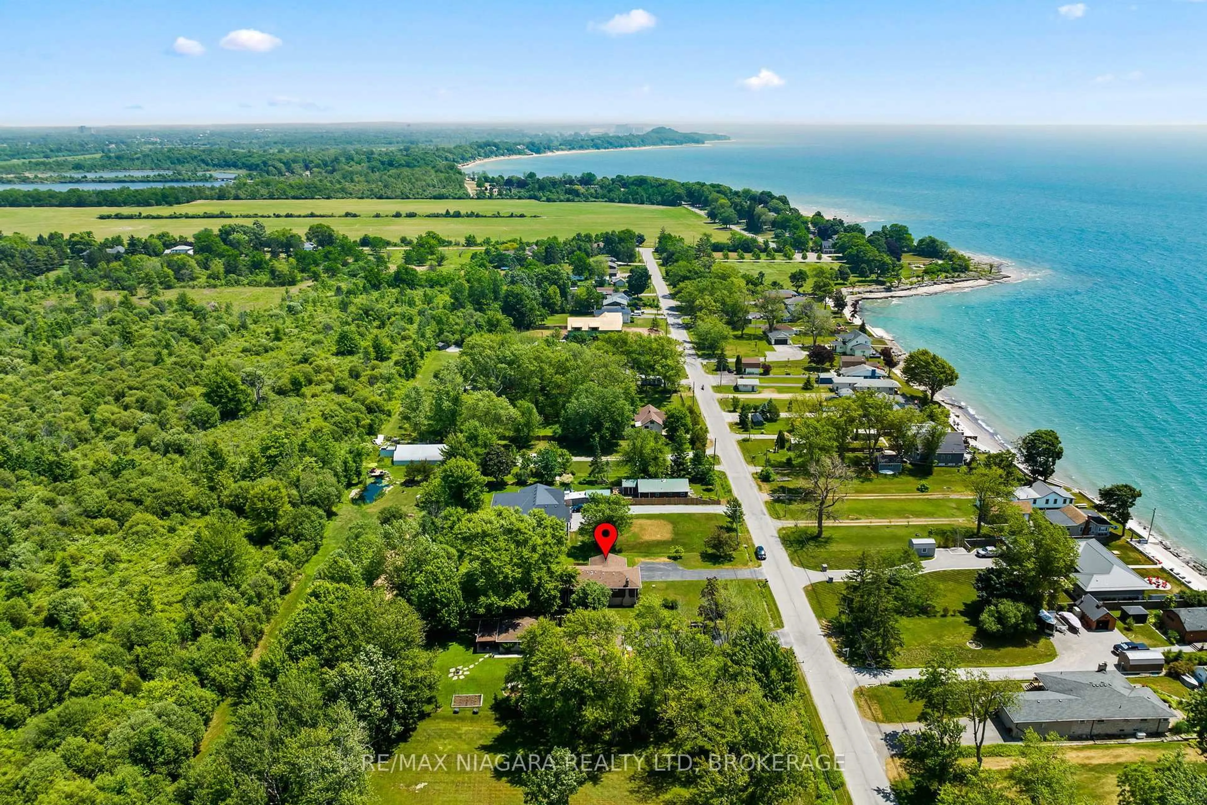 A pic from outside/outdoor area/front of a property/back of a property/a pic from drone, water/lake/river/ocean view for 10960 Lakeshore Rd, Wainfleet Ontario L3K 5V4