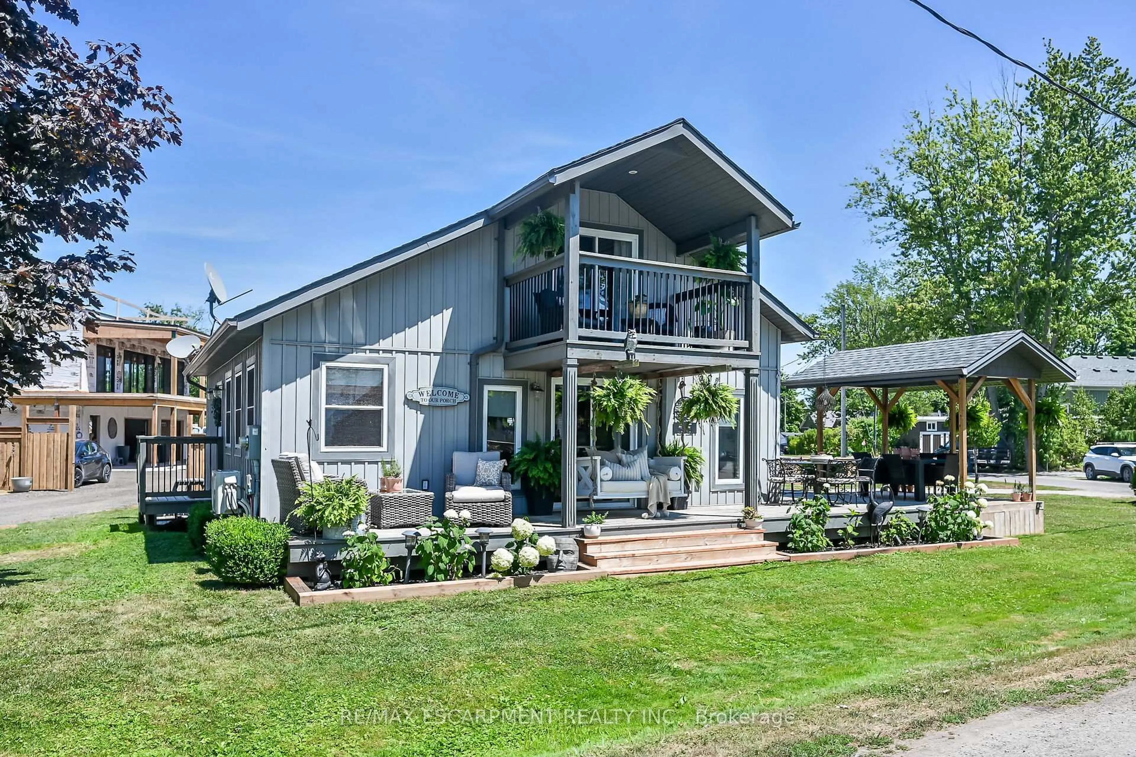 Home with vinyl exterior material, street for 55 LAKESIDE Dr, Haldimand Ontario N0A 1L0