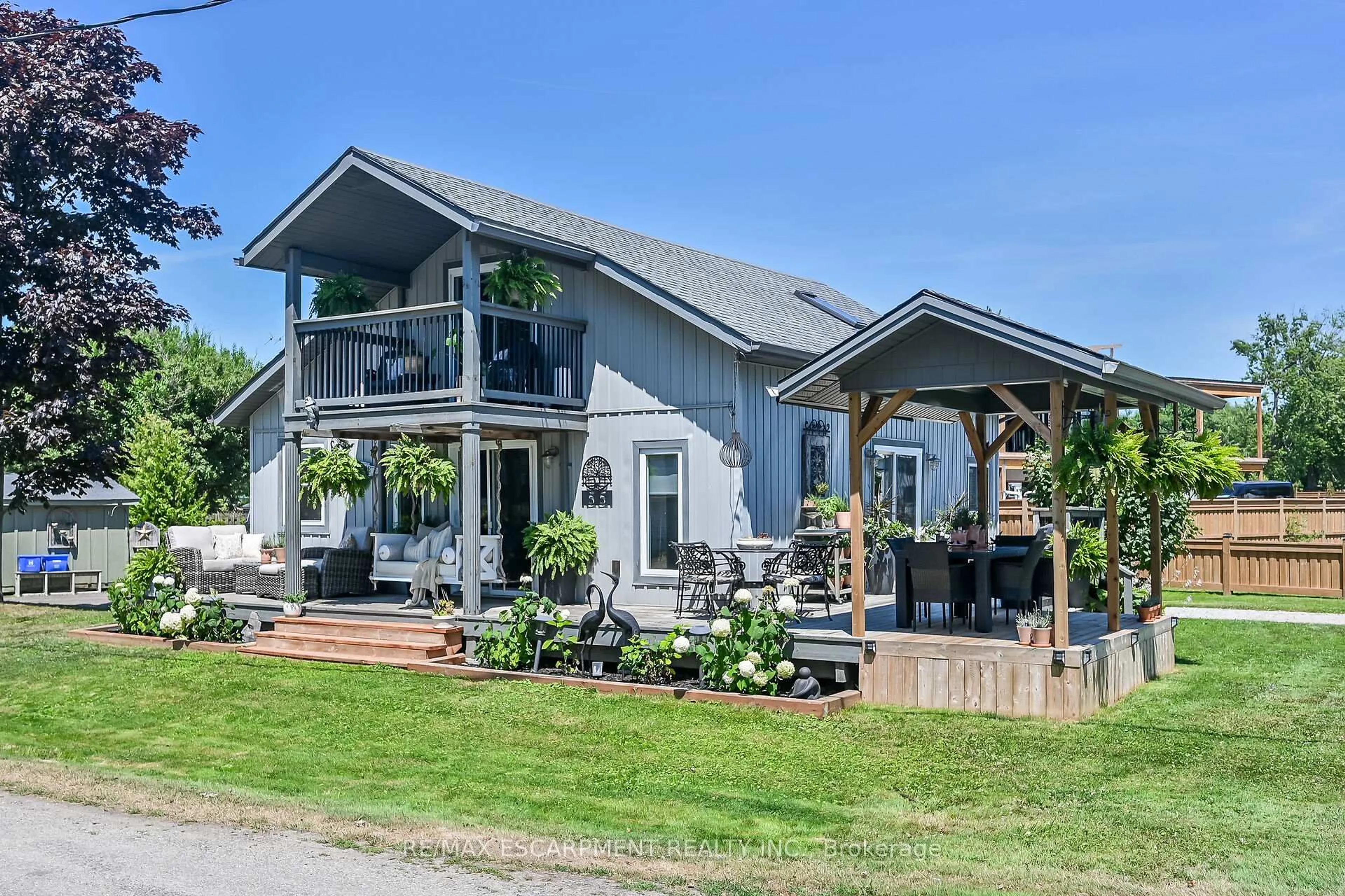 Home with vinyl exterior material, street for 55 LAKESIDE Dr, Haldimand Ontario N0A 1L0