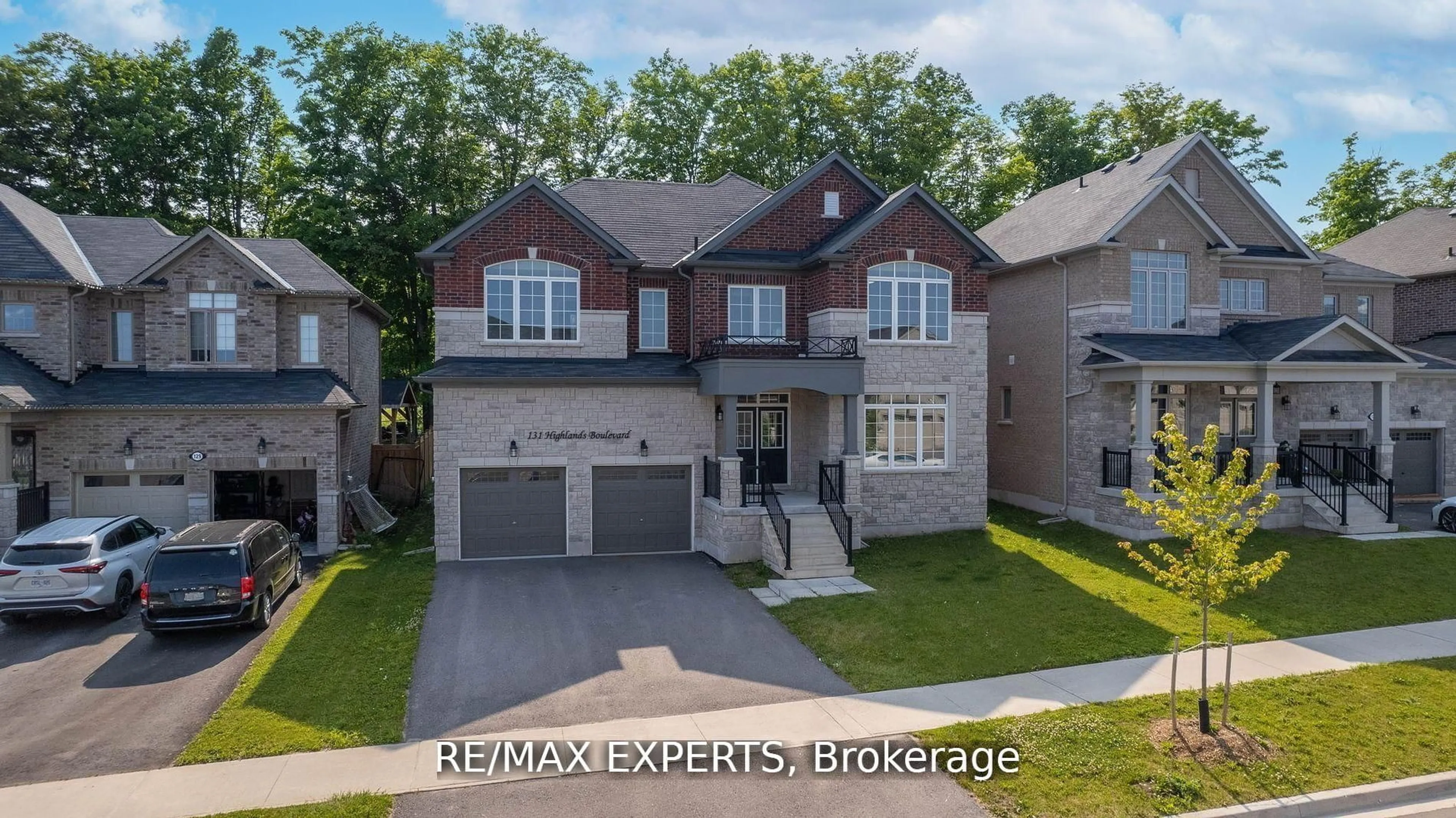 Home with brick exterior material, street for 131 Highlands Blvd, Cavan Monaghan Ontario L0A 1G0
