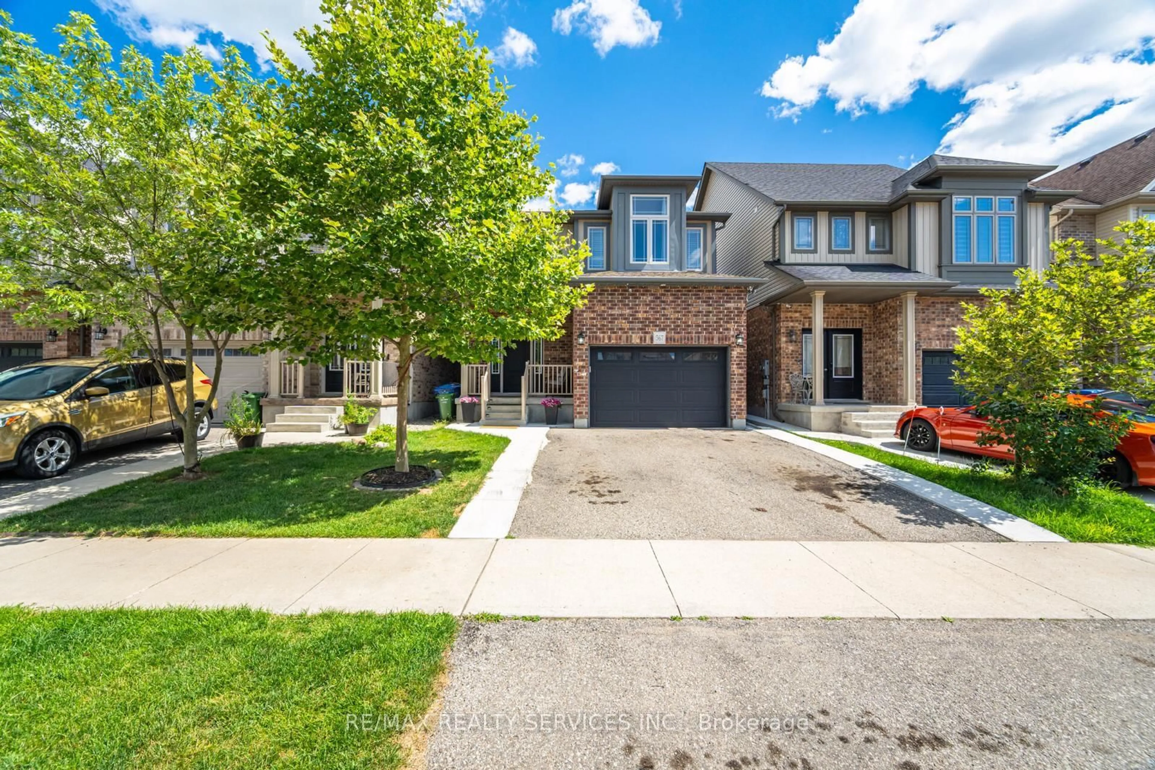 Home with brick exterior material, street for 567 Starwood Dr, Guelph Ontario N1E 0L9