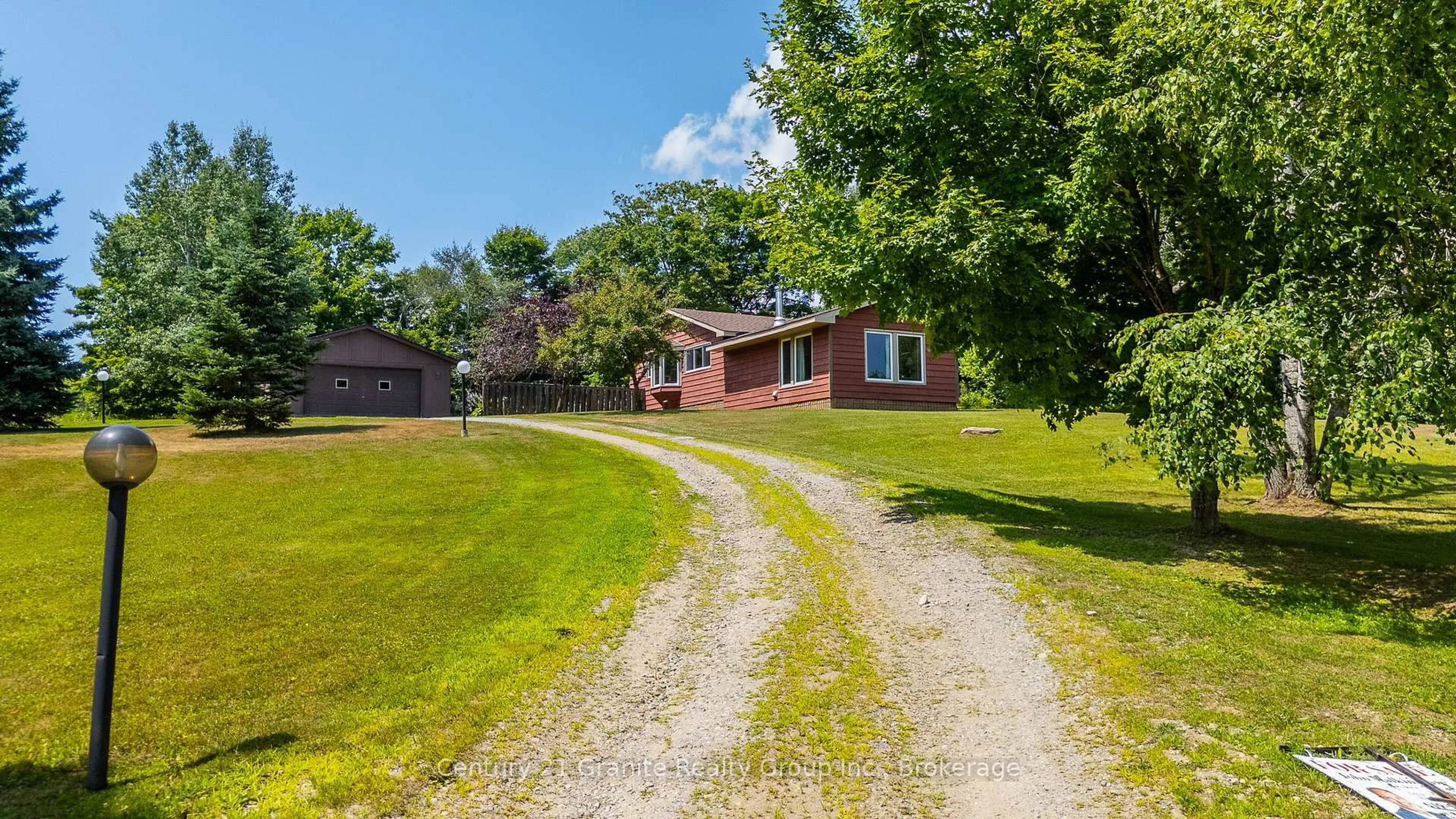 A pic from outside/outdoor area/front of a property/back of a property/a pic from drone, street for 1037 Kernohan Farm Tr, Minden Hills Ontario K0M 2K0