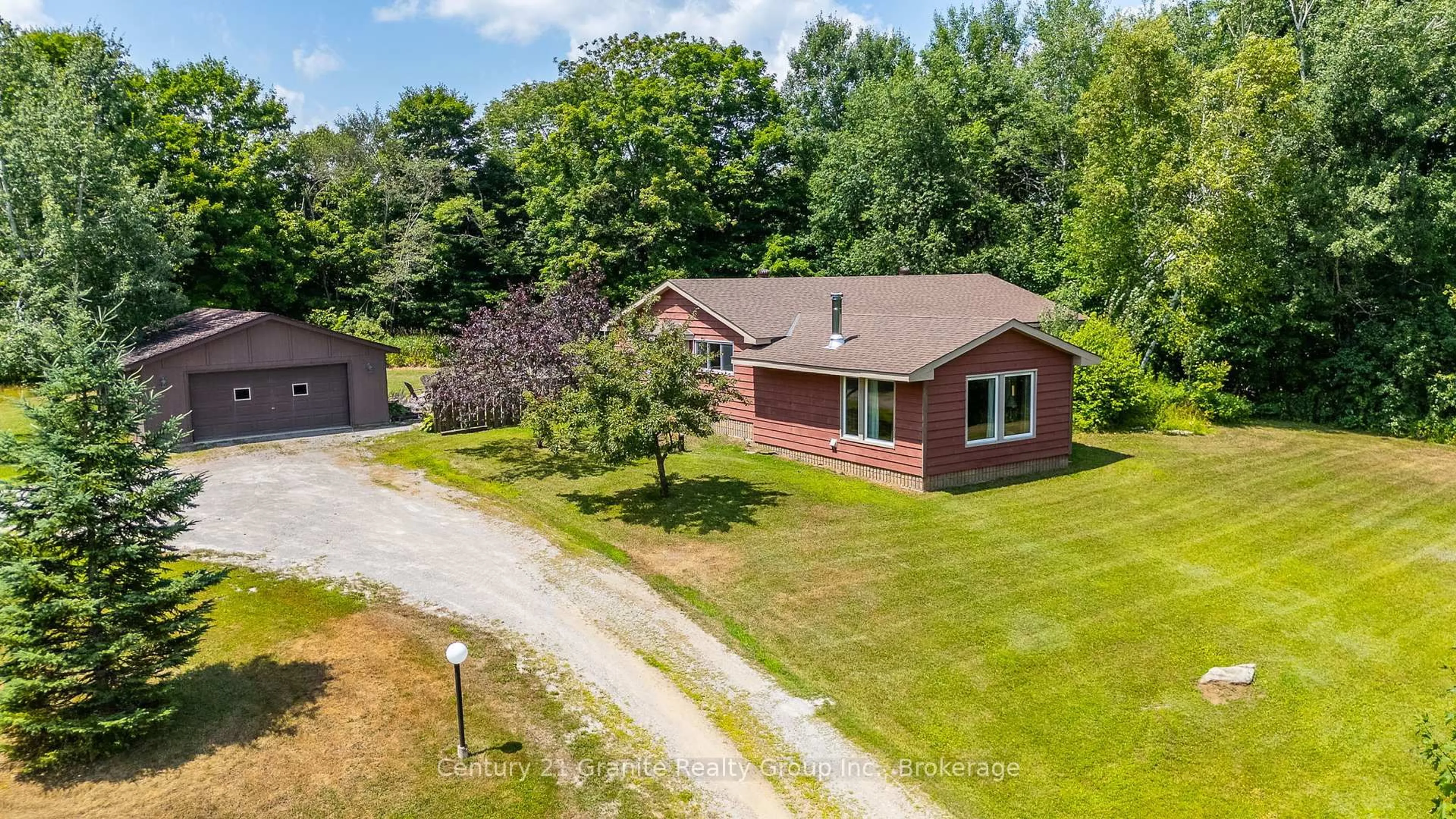 A pic from outside/outdoor area/front of a property/back of a property/a pic from drone, unknown for 1037 Kernohan Farm Tr, Minden Hills Ontario K0M 2K0