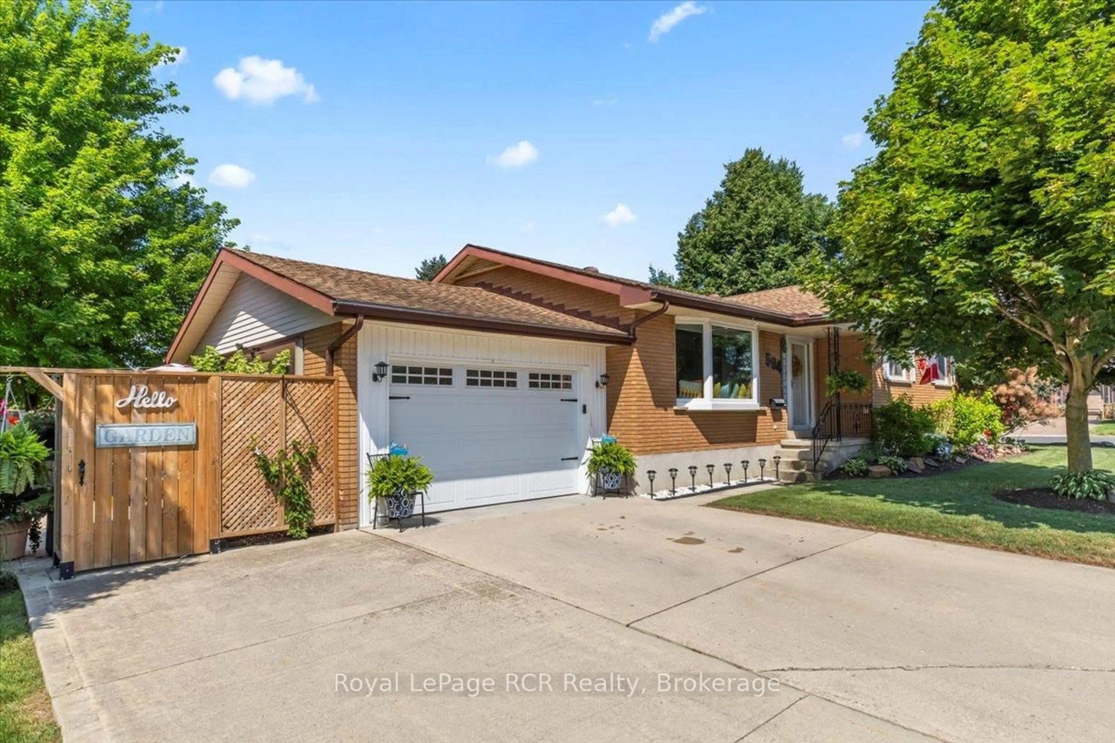 Home with brick exterior material, street for 594 17th Ave, Hanover Ontario N4N 3A9
