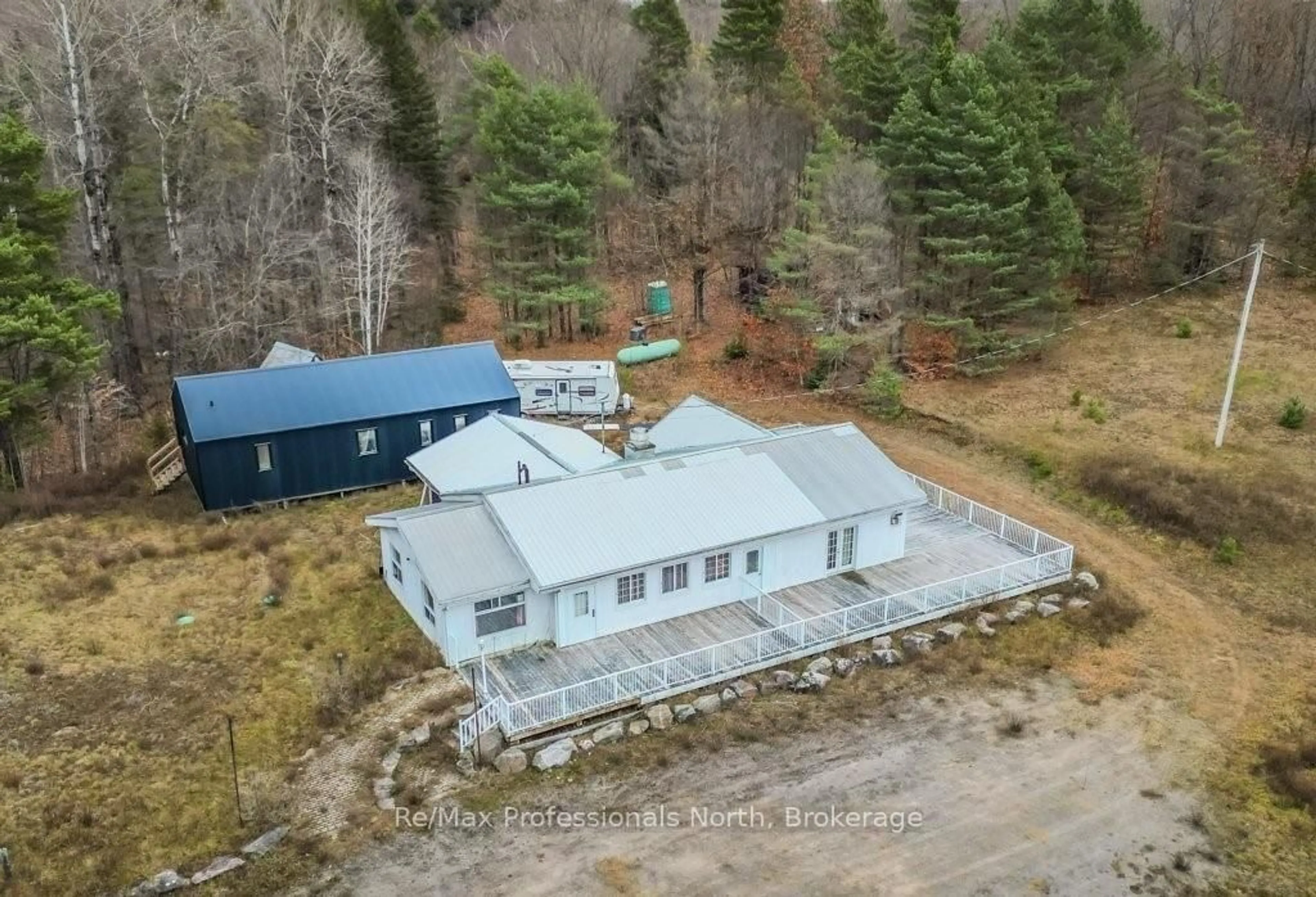 A pic from outside/outdoor area/front of a property/back of a property/a pic from drone, unknown for 2180-2186 HIGHWAY 141, Muskoka Lakes Ontario P0B 1M0