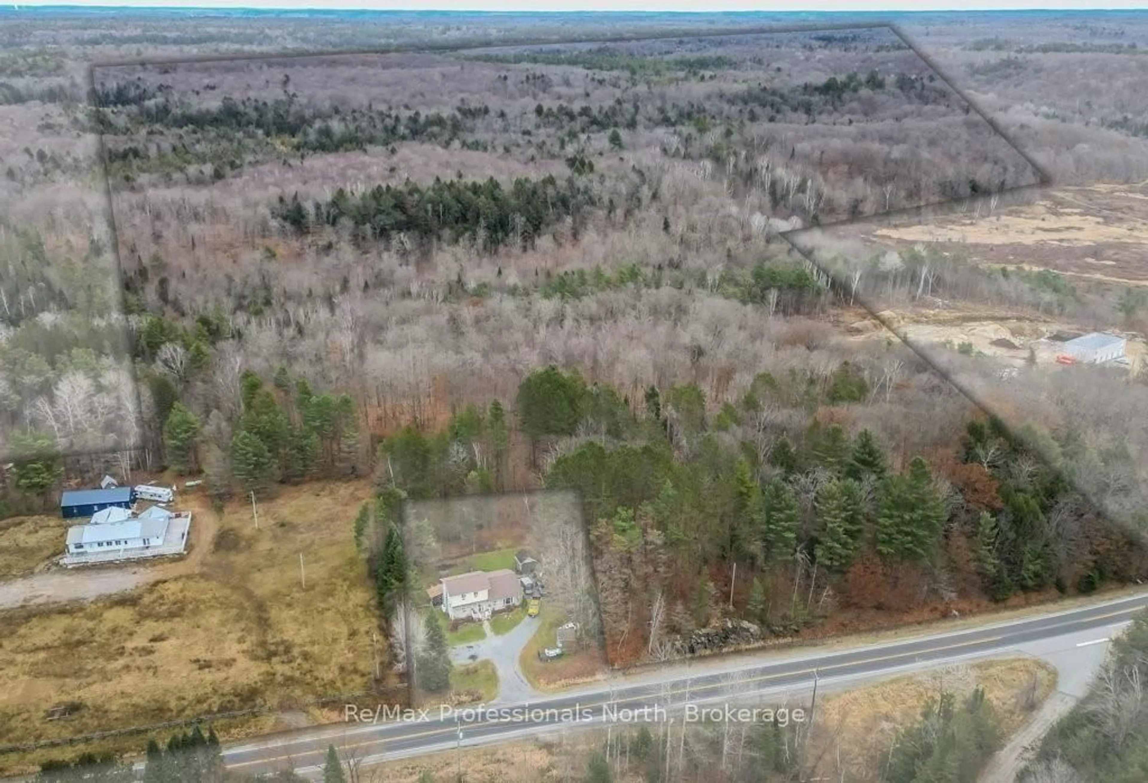 A pic from outside/outdoor area/front of a property/back of a property/a pic from drone, forest/trees view for 2180-2186 HIGHWAY 141, Muskoka Lakes Ontario P0B 1M0