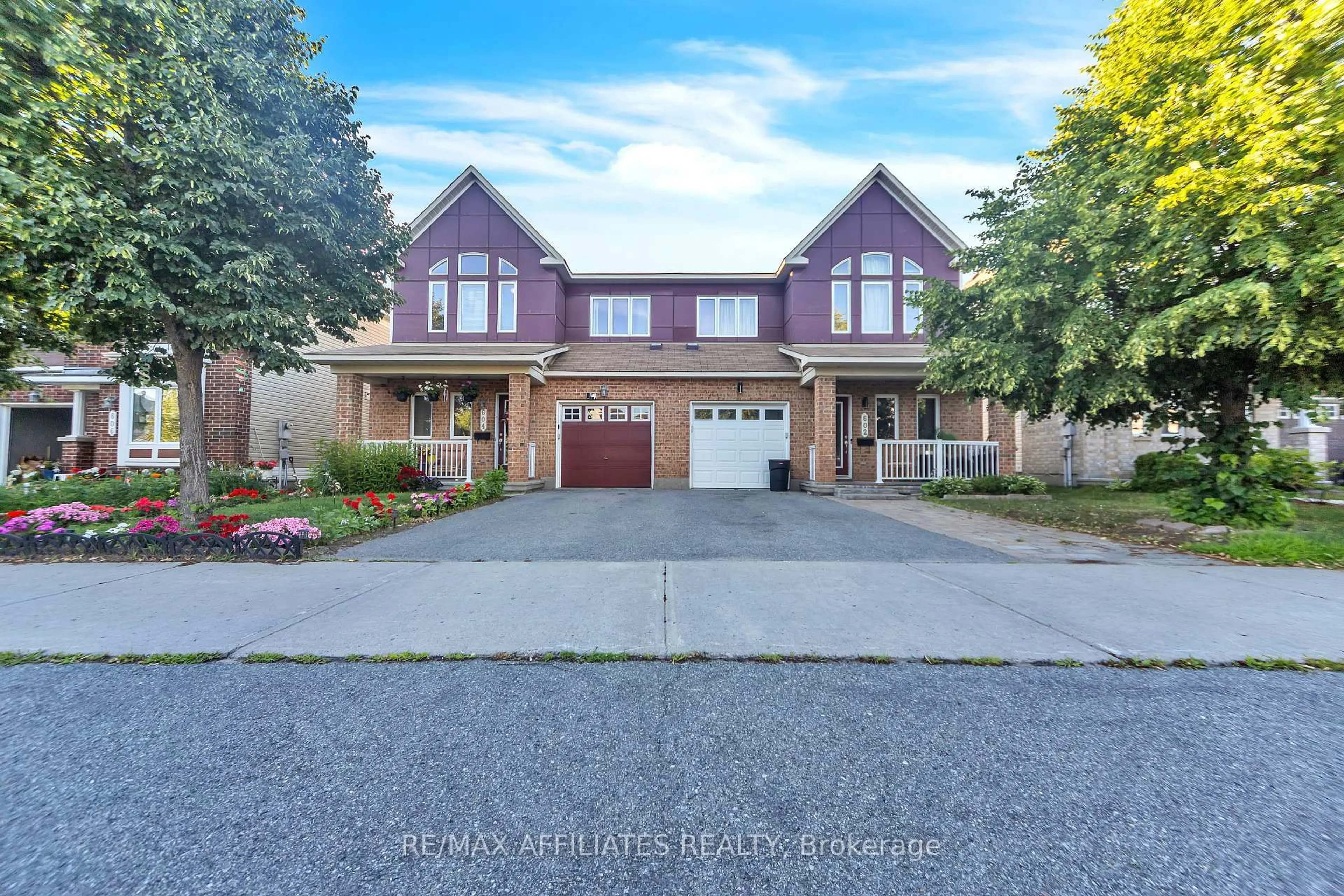 Home with brick exterior material, street for 604 Paul Metivier Dr, Ottawa Ontario K2J 0X9