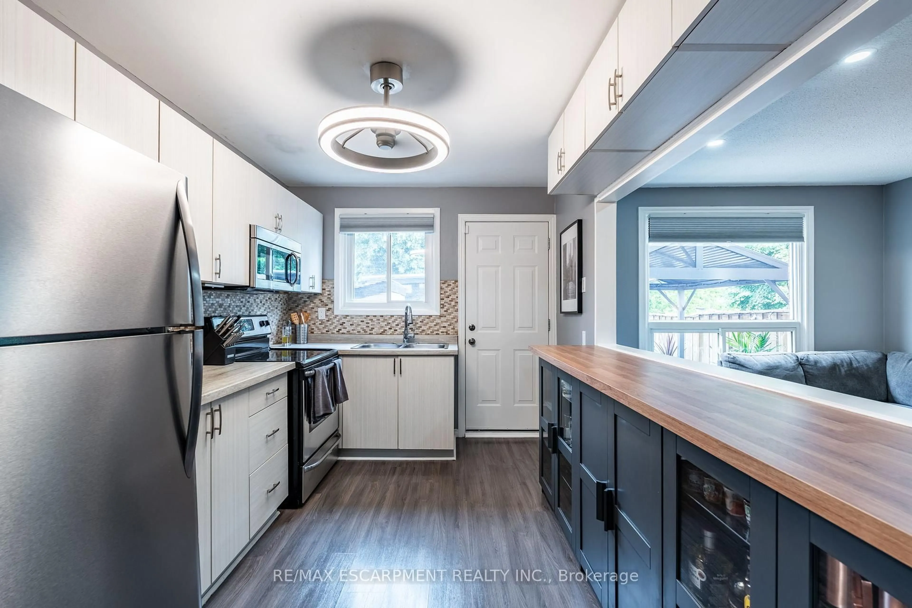 Open concept kitchen, wood/laminate floor for 1350 Limeridge Rd #42, Hamilton Ontario L8W 1L6
