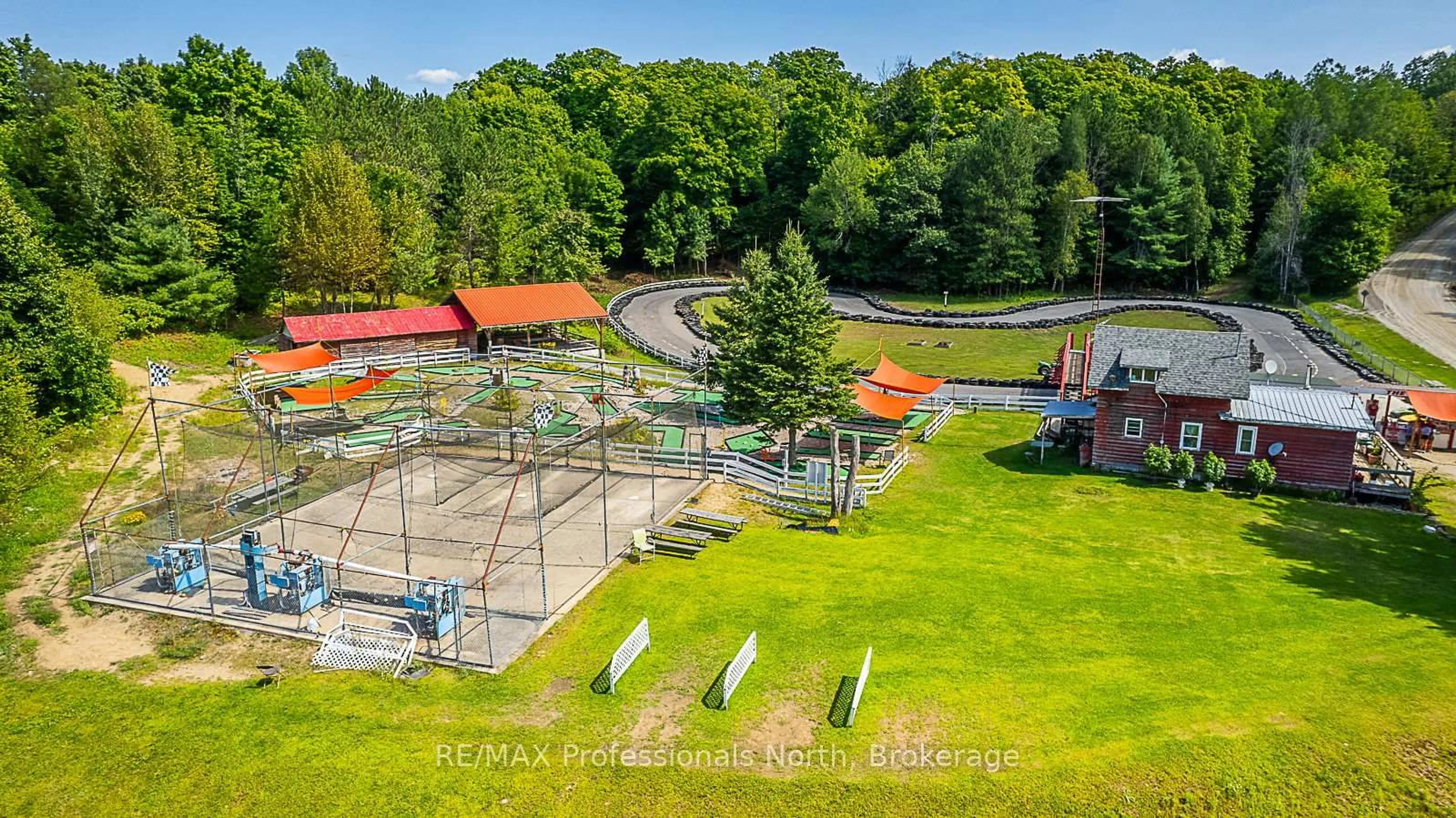 A pic from outside/outdoor area/front of a property/back of a property/a pic from drone, water/lake/river/ocean view for 1063 RAVINE Rd, Minden Hills Ontario K0M 2K0