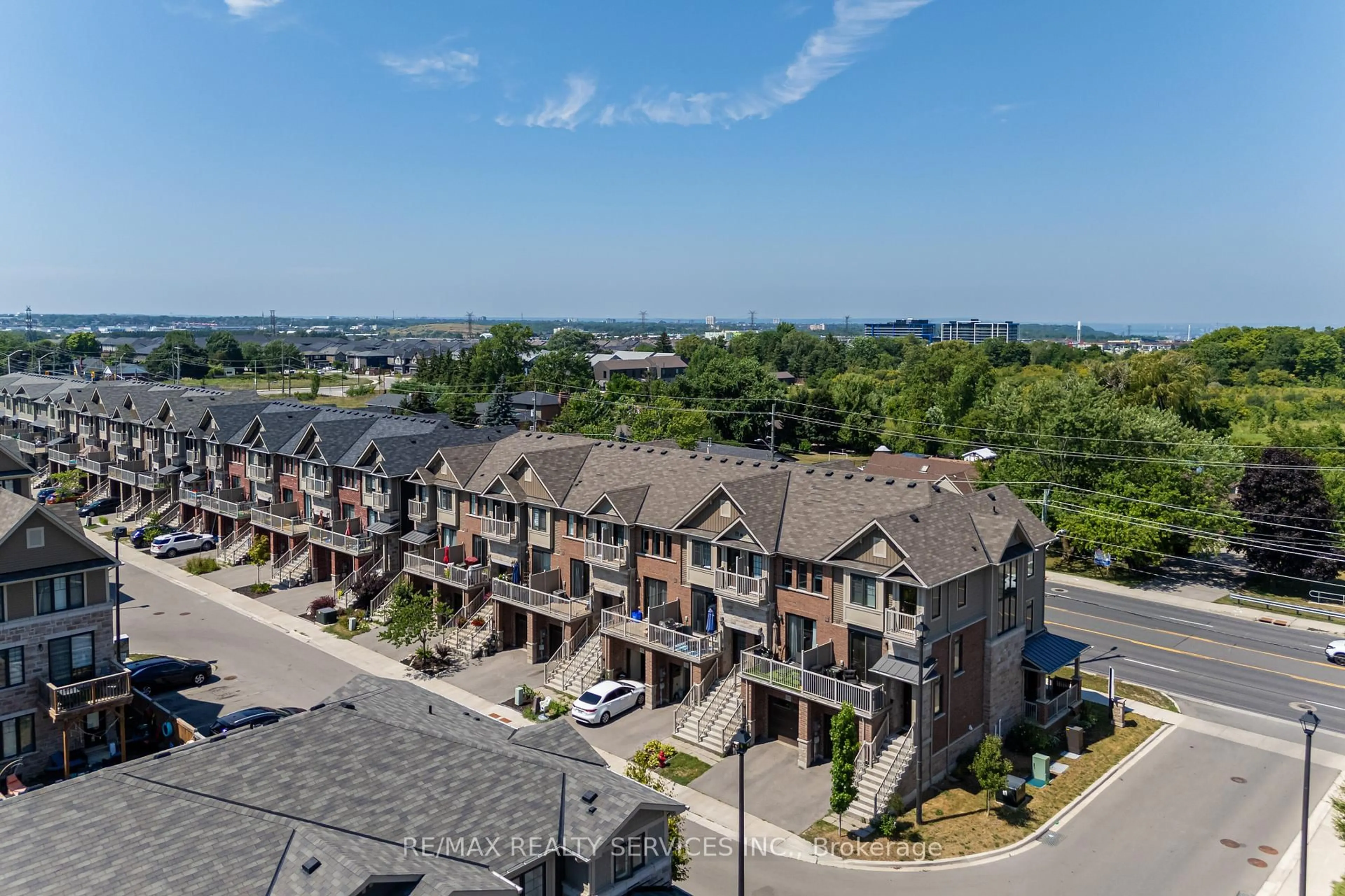 A pic from outside/outdoor area/front of a property/back of a property/a pic from drone, unknown for 1890 Rymal Rd #122, Hamilton Ontario L0R 1P0