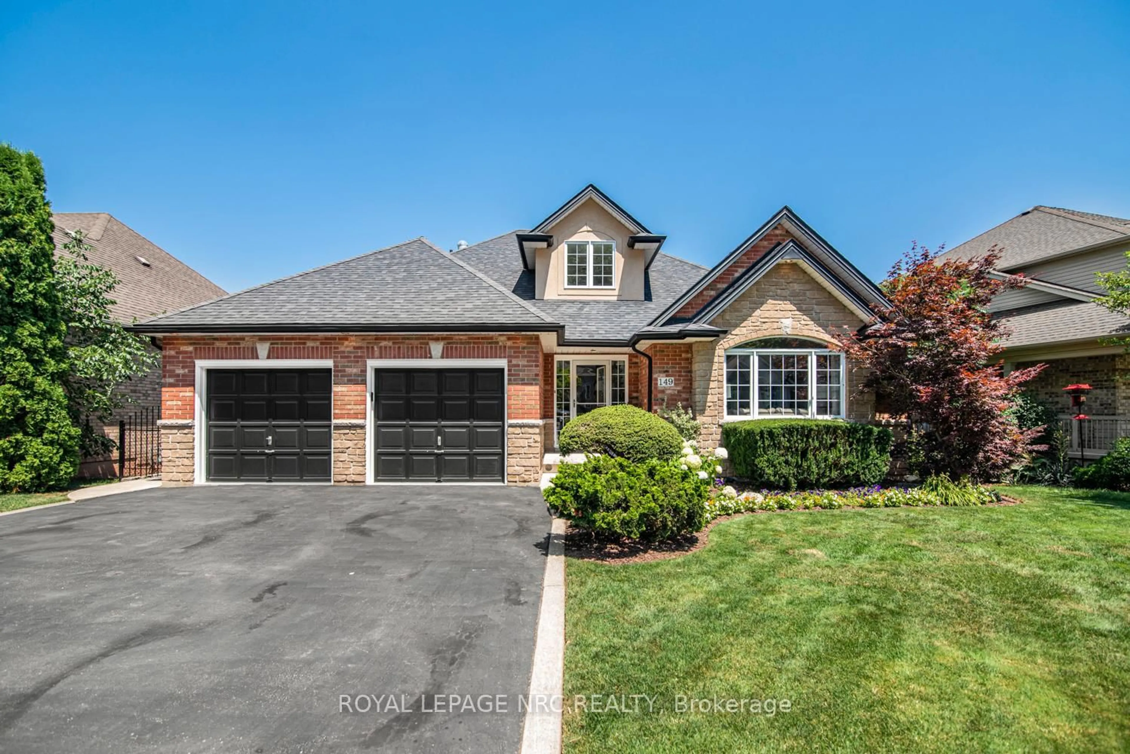 Home with brick exterior material, street for 149 Dorchester Dr, Grimsby Ontario L3M 5J9