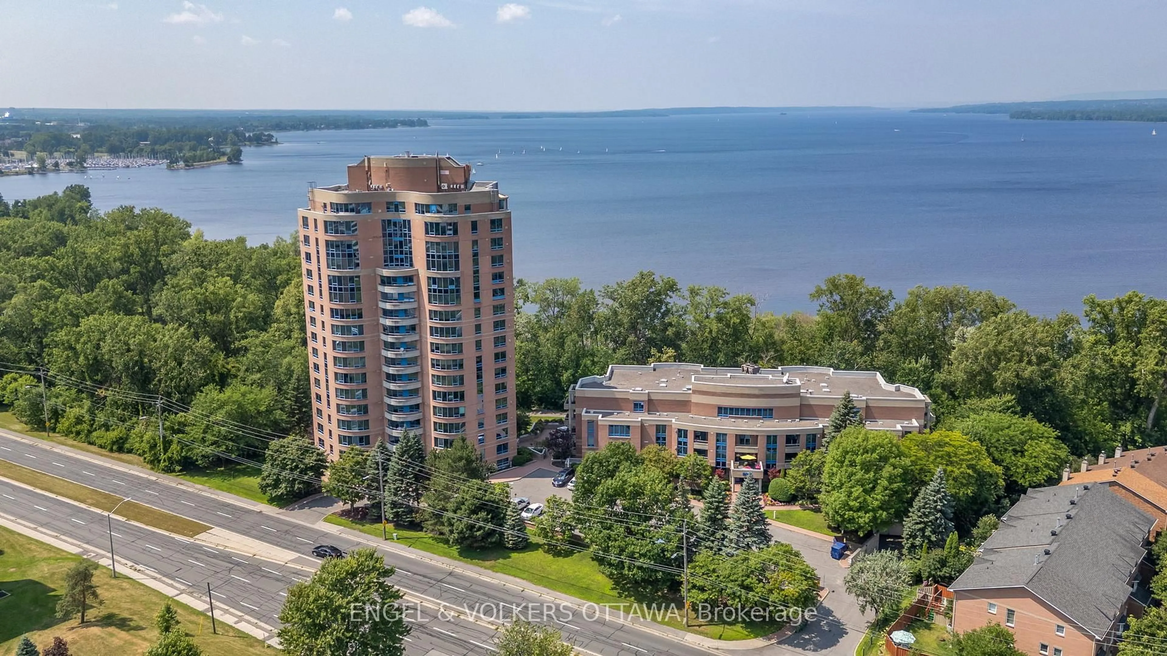 A pic from outside/outdoor area/front of a property/back of a property/a pic from drone, water/lake/river/ocean view for 3105 Carling Ave #305, Ottawa Ontario K2H 5A6