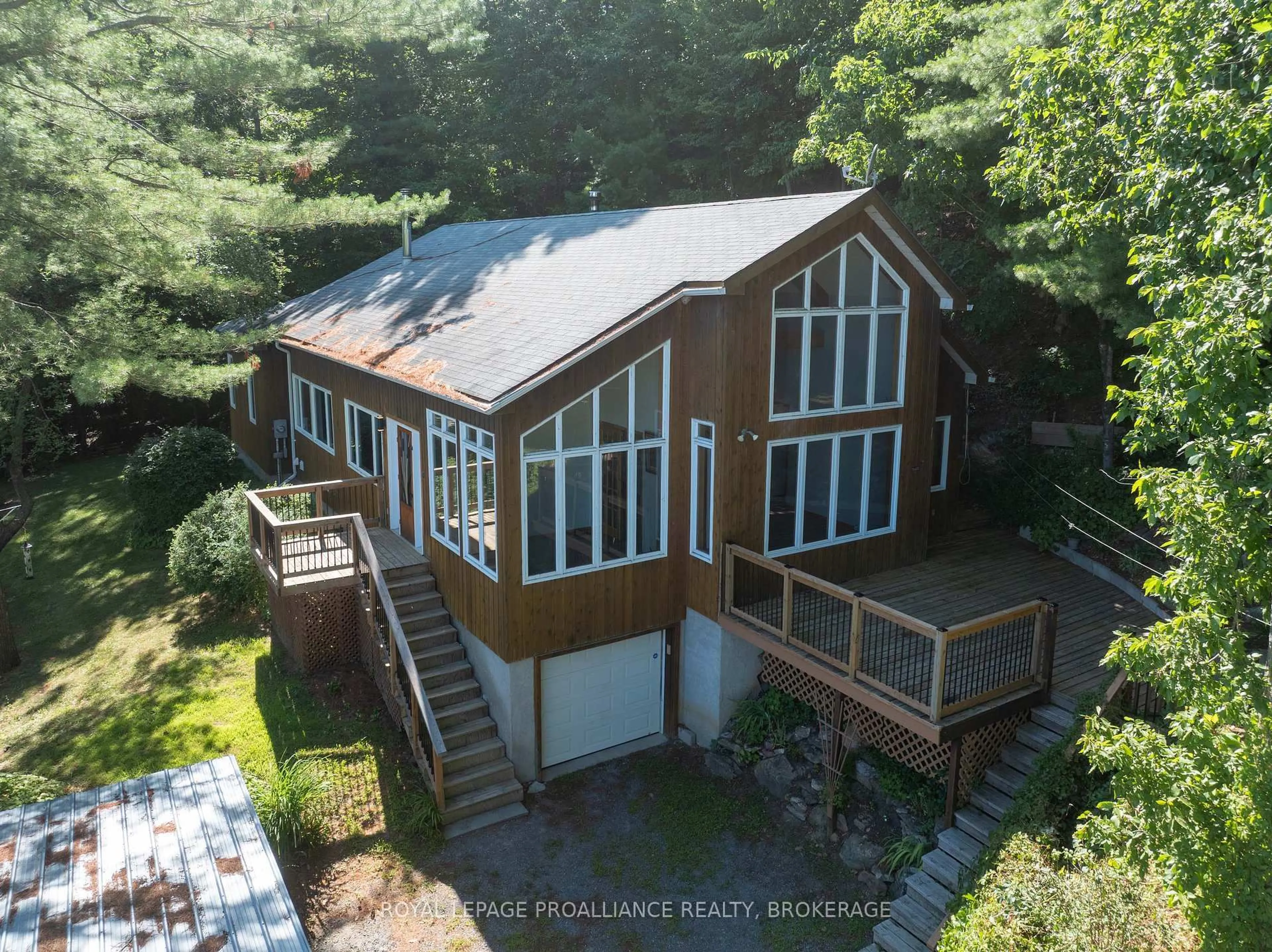 A pic from outside/outdoor area/front of a property/back of a property/a pic from drone, water/lake/river/ocean view for 1512 Chaffey's Lock Rd, Rideau Lakes Ontario K0G 1E0