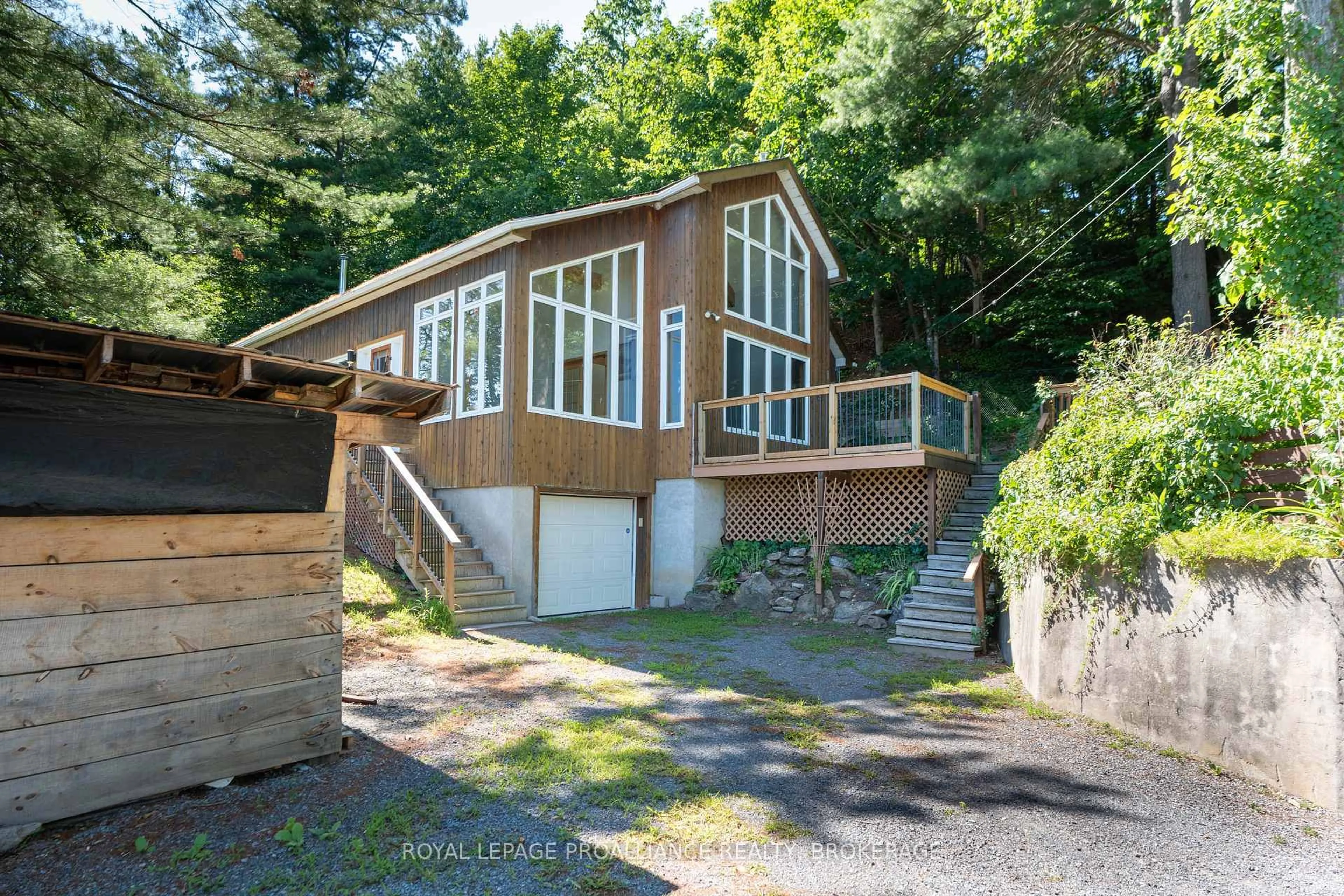 A pic from outside/outdoor area/front of a property/back of a property/a pic from drone, unknown for 1512 Chaffey's Lock Rd, Rideau Lakes Ontario K0G 1E0