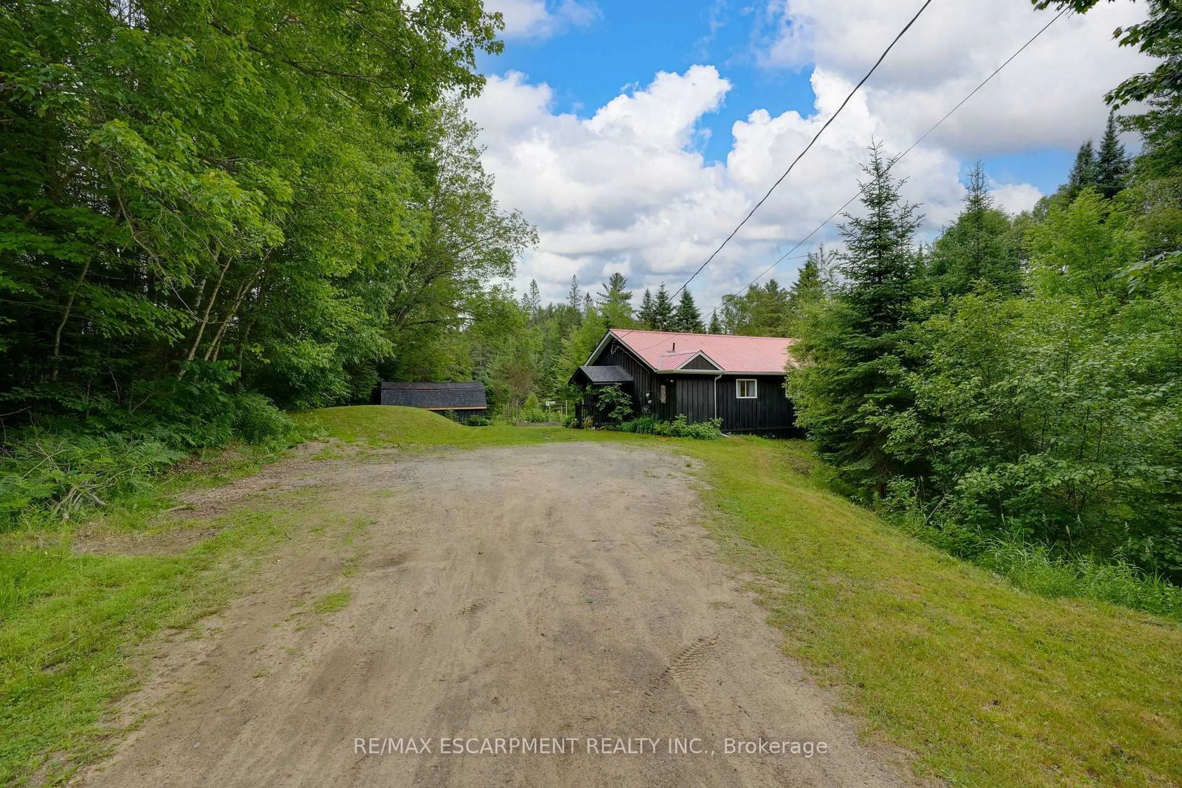 A pic from outside/outdoor area/front of a property/back of a property/a pic from drone, unknown for 223 Laneige Ave, Huntsville Ontario P0B 1L0