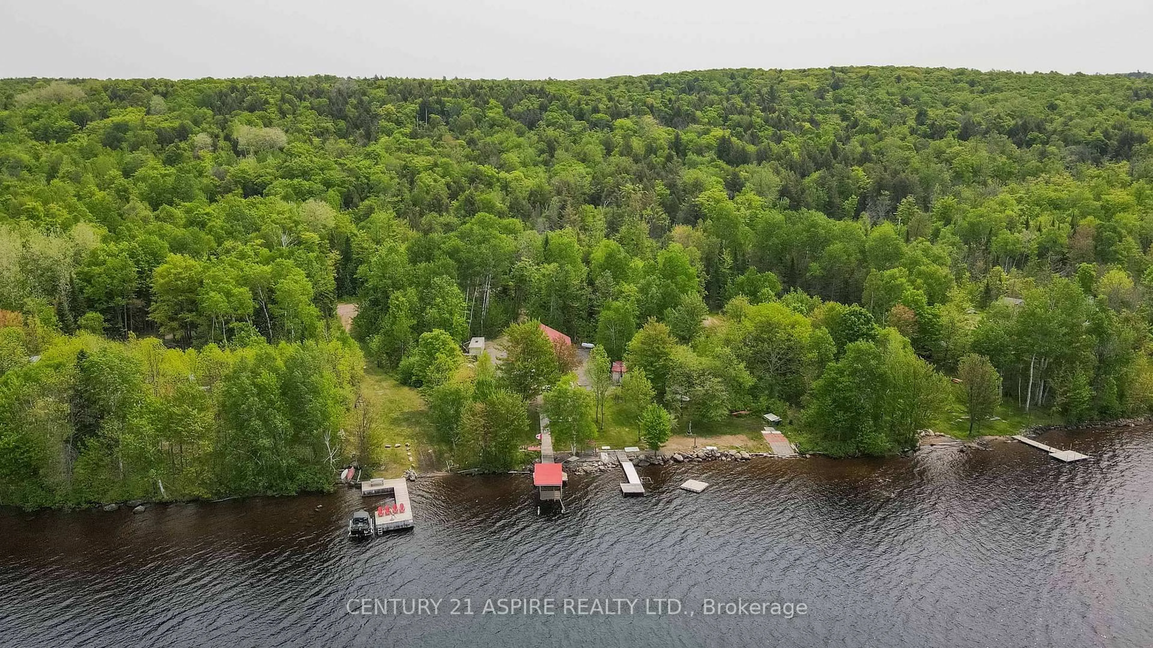 A pic from outside/outdoor area/front of a property/back of a property/a pic from drone, water/lake/river/ocean view for 697 Curtiss Rd, Barry's Bay Ontario K0J 1B0