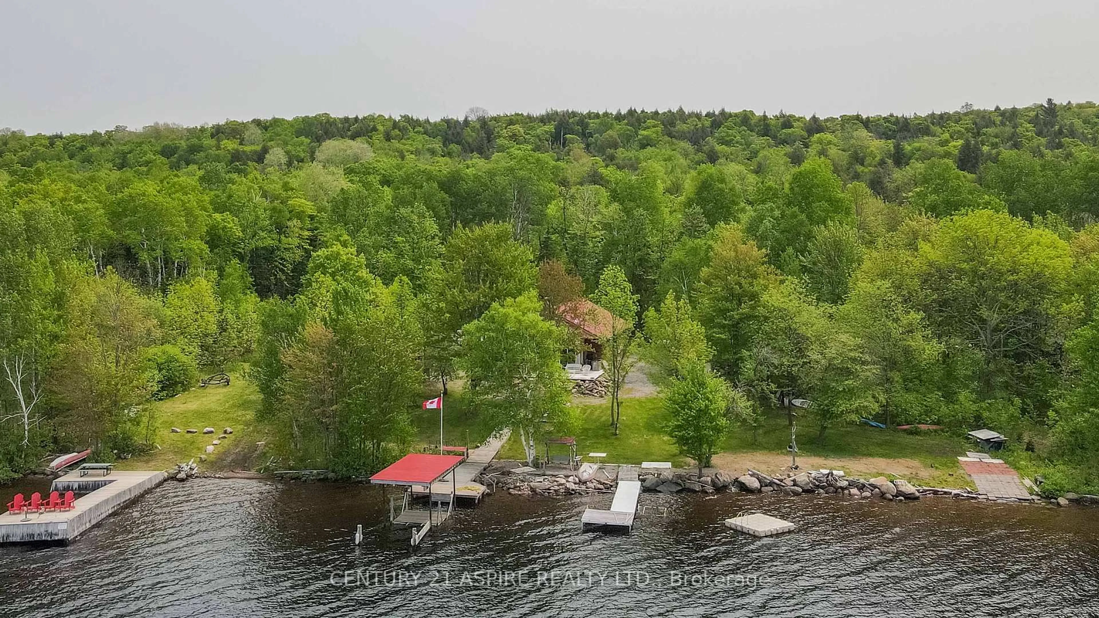 A pic from outside/outdoor area/front of a property/back of a property/a pic from drone, water/lake/river/ocean view for 697 Curtiss Rd, Barry's Bay Ontario K0J 1B0