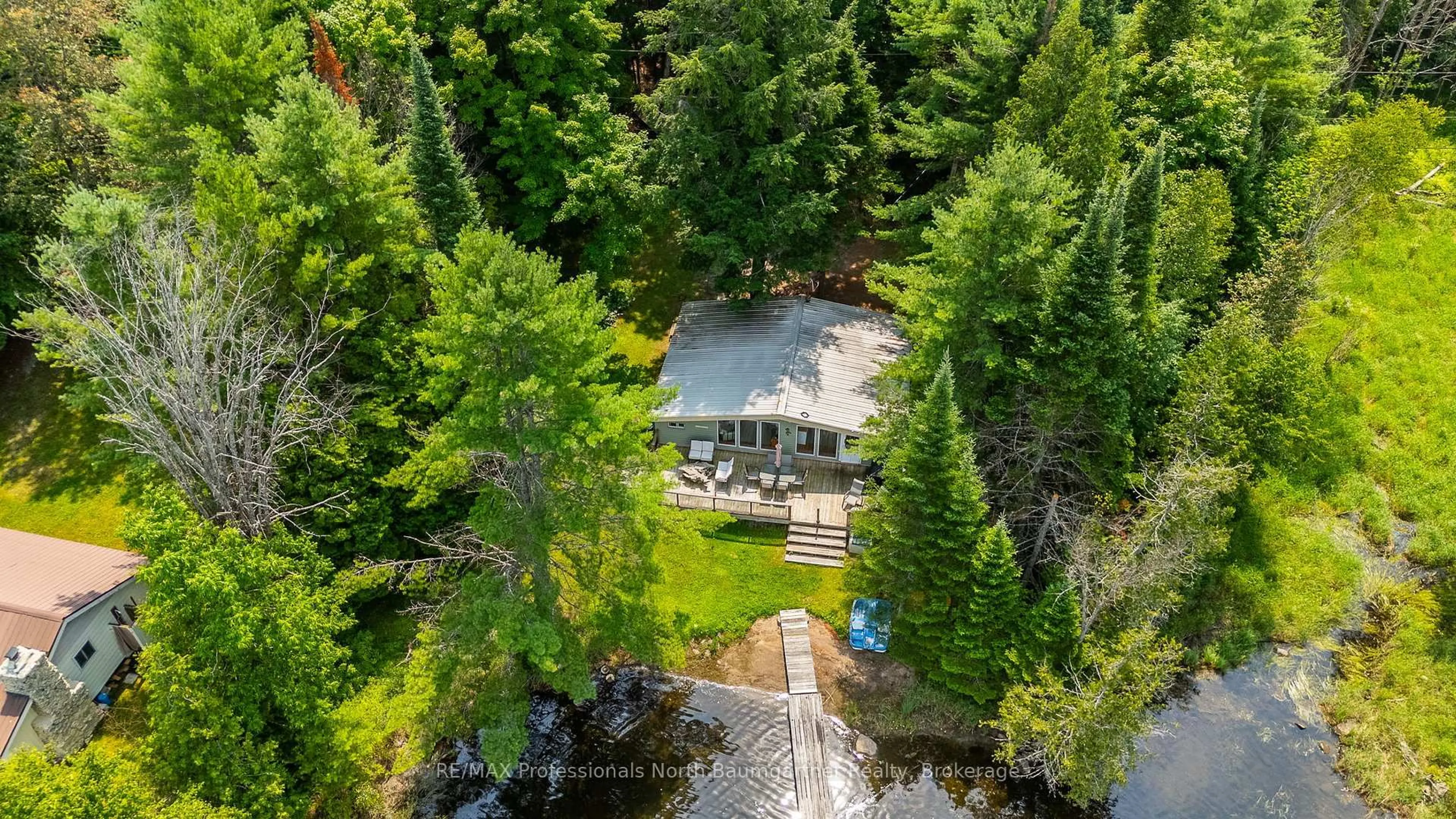 A pic from outside/outdoor area/front of a property/back of a property/a pic from drone, forest/trees view for 1056 Kodiak Tr, Highlands East Ontario K0M 1R0