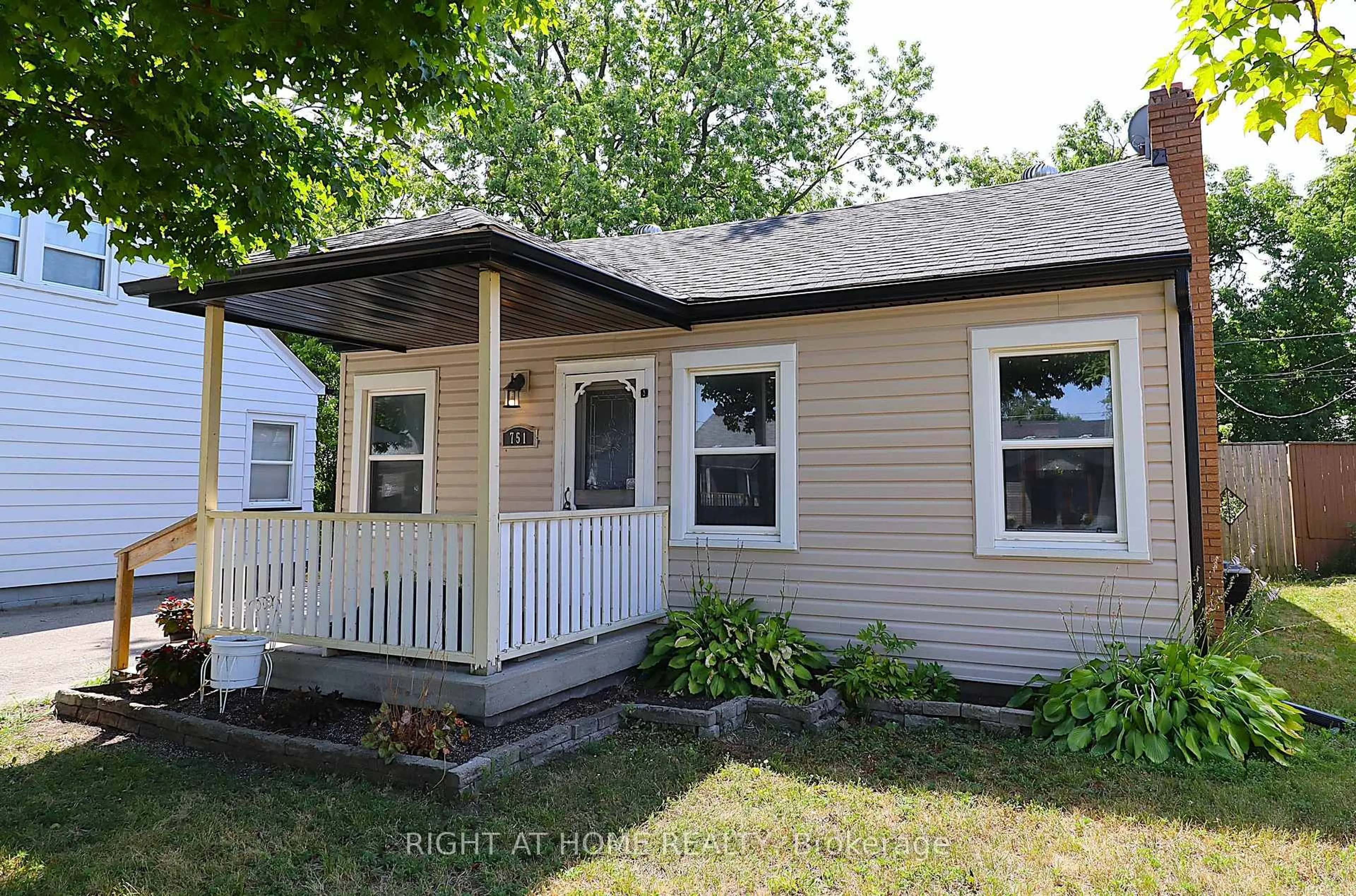 Home with vinyl exterior material, street for 751 St Mary's St, Peterborough Central Ontario K9J 4H1