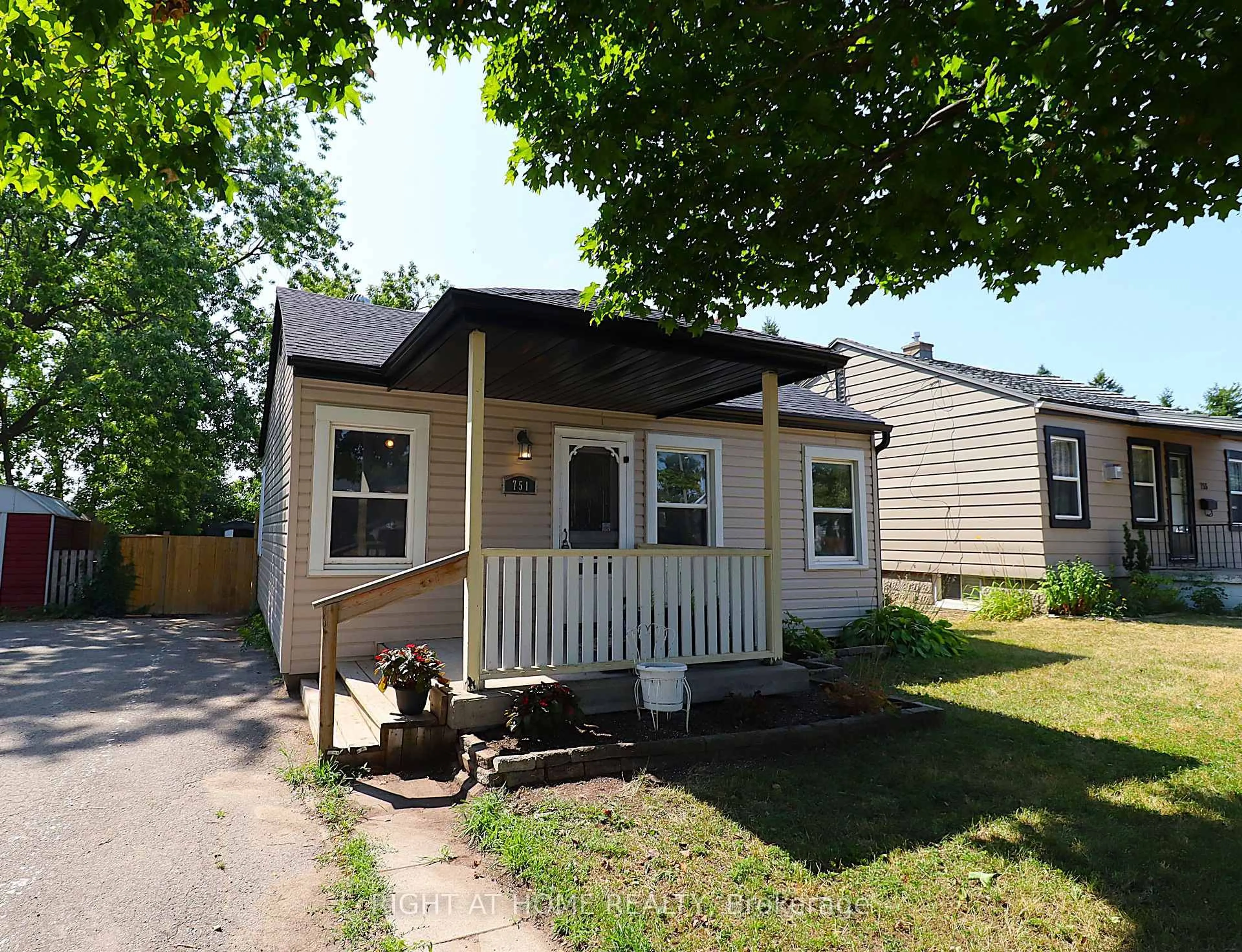 Home with vinyl exterior material, street for 751 St Mary's St, Peterborough Central Ontario K9J 4H1