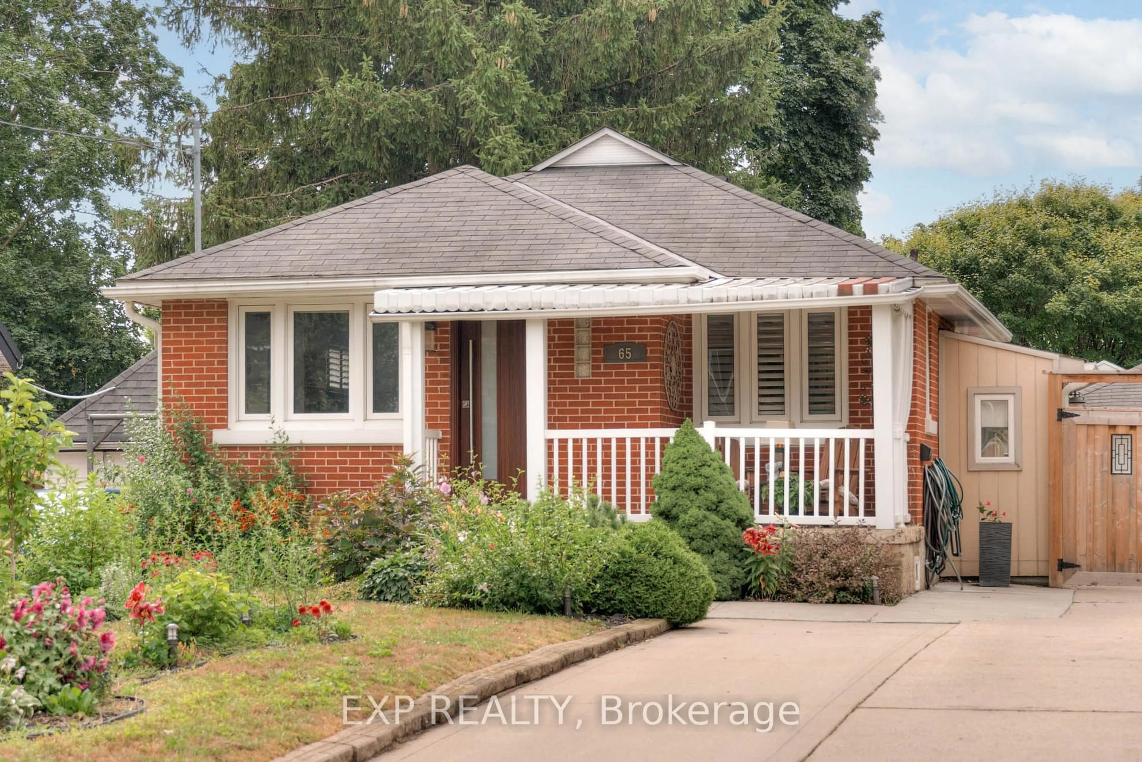 Home with brick exterior material, street for 65 Belleview Ave, Kitchener Ontario N2B 1G4