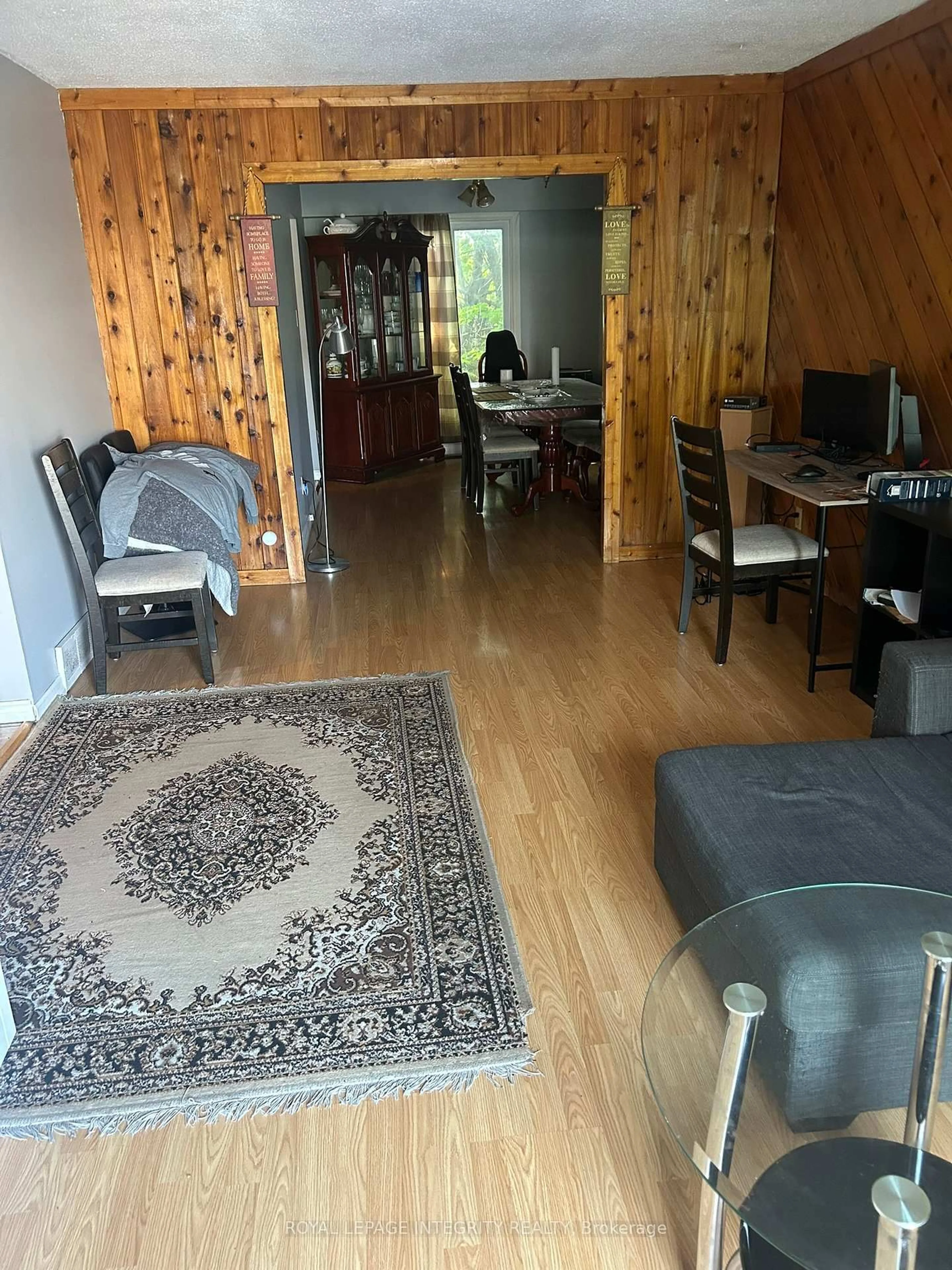Living room with furniture, wood/laminate floor for 1138 Alenmede Cres, Ottawa Ontario K2B 8H3