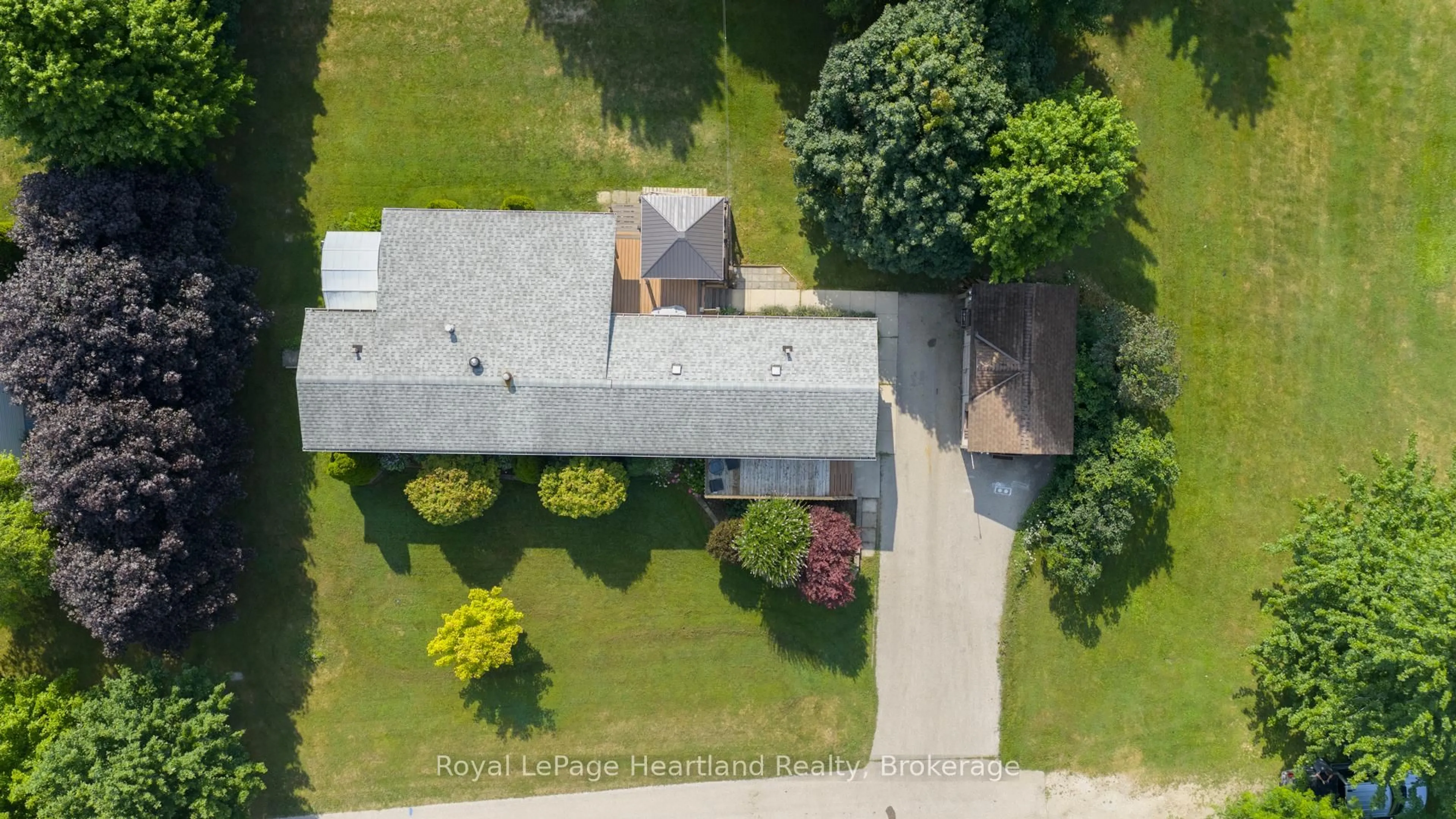 A pic from outside/outdoor area/front of a property/back of a property/a pic from drone, street for 240 Hickory Lane, Perth East Ontario N5A 6S6