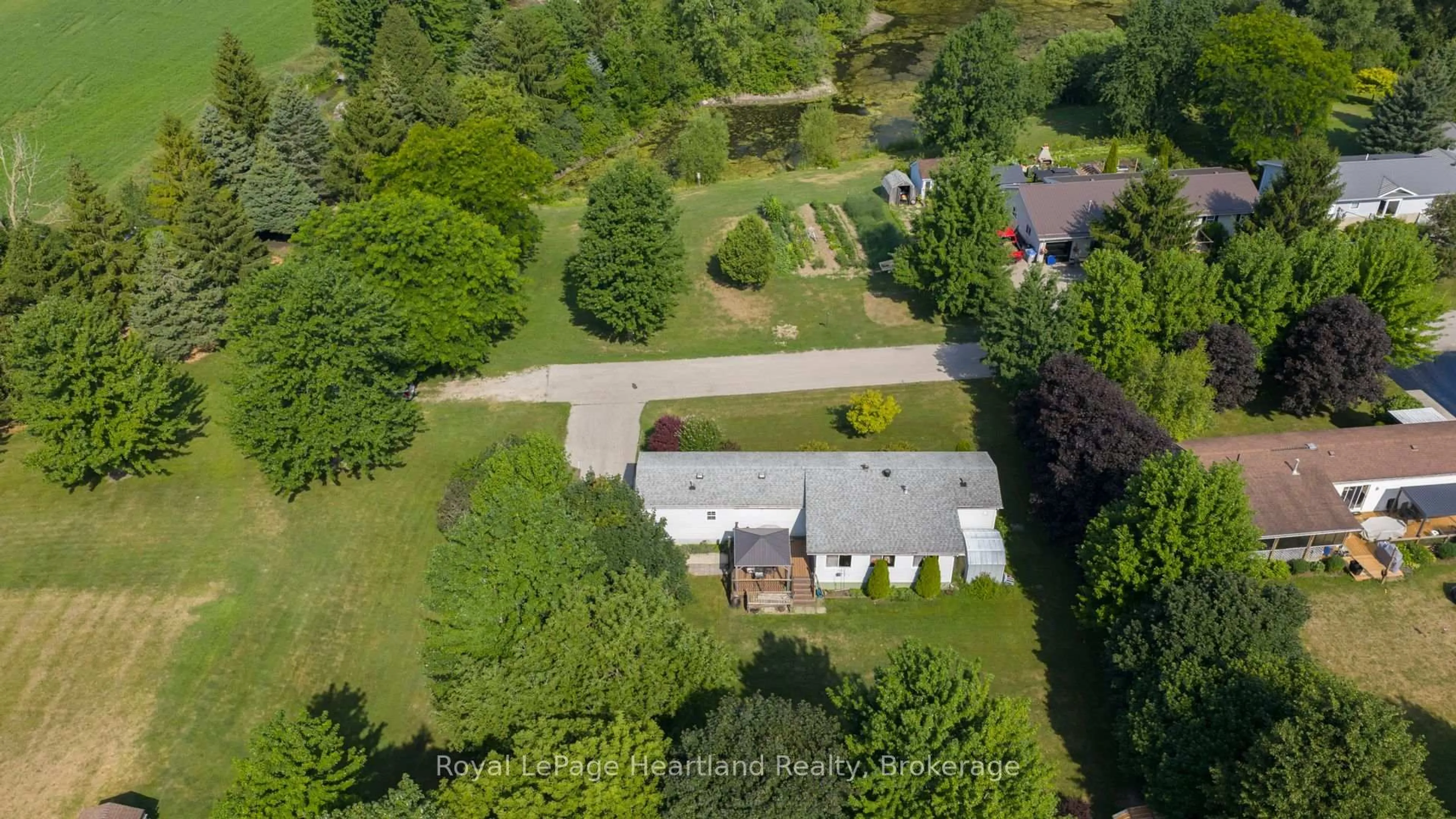 A pic from outside/outdoor area/front of a property/back of a property/a pic from drone, street for 240 Hickory Lane, Perth East Ontario N5A 6S6