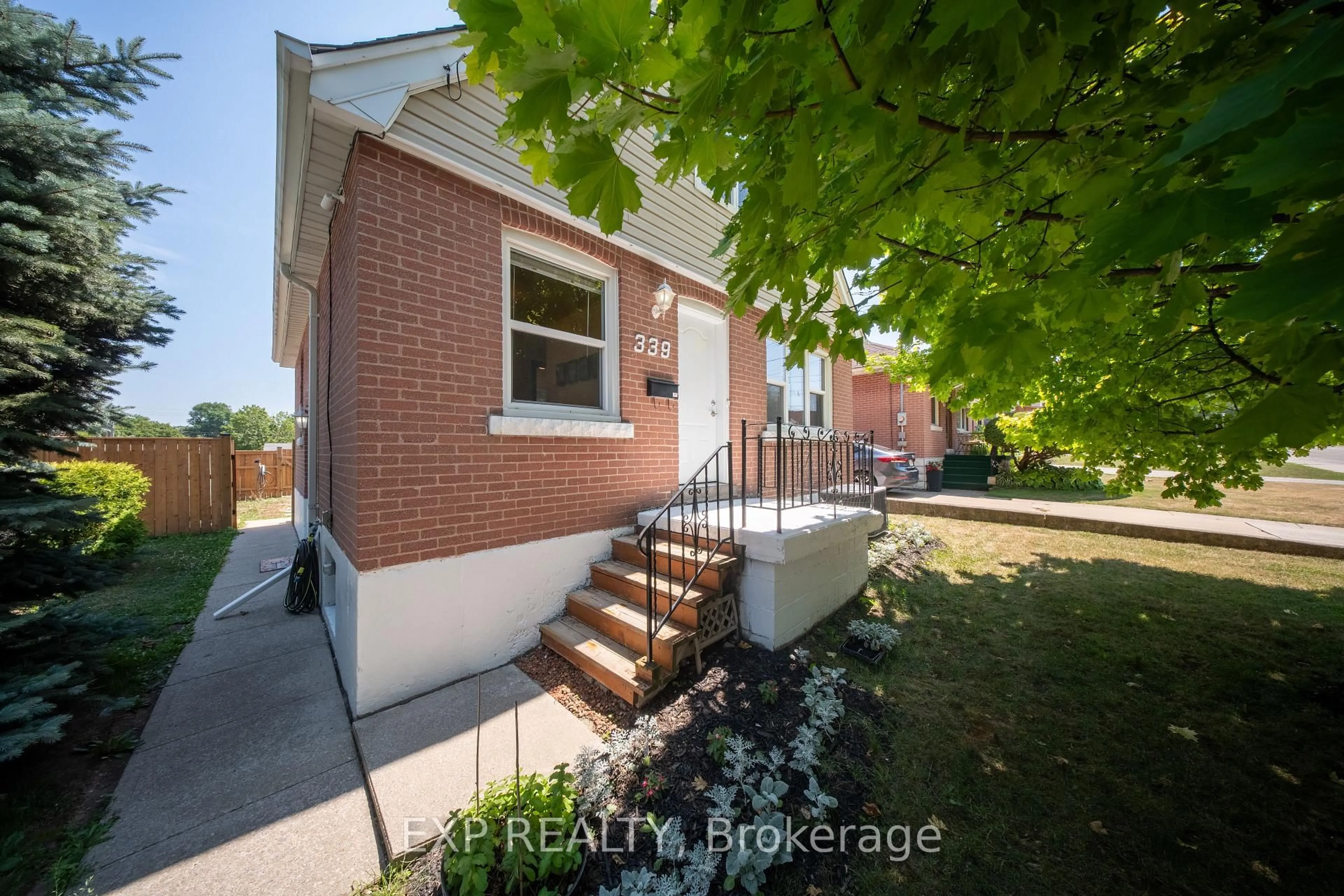 Home with brick exterior material, street for 339 Arlington Rd, Hamilton Ontario L8K 3K6