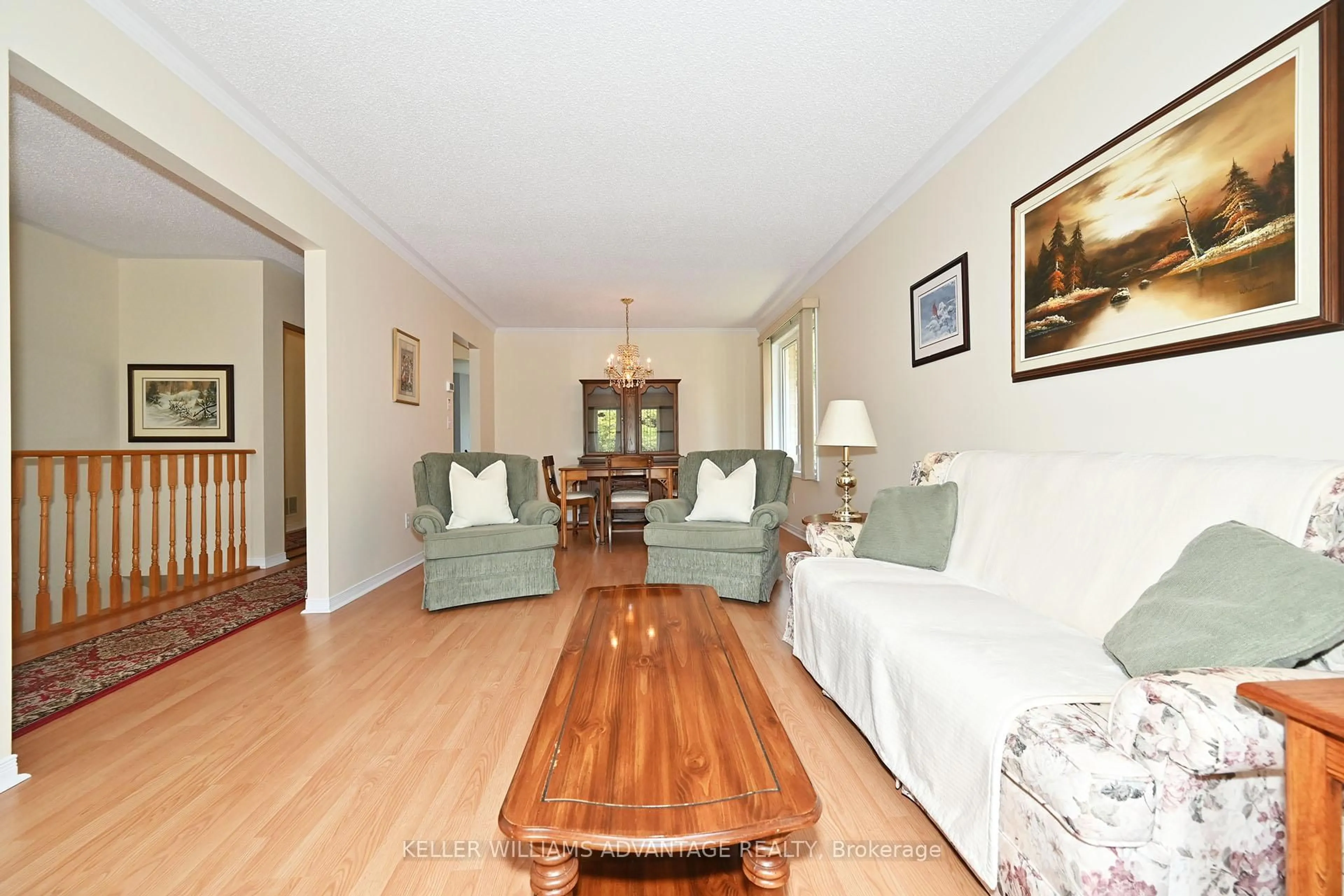 Living room with furniture, wood/laminate floor for 90 East House Cres, Cobourg Ontario K9A 5K3