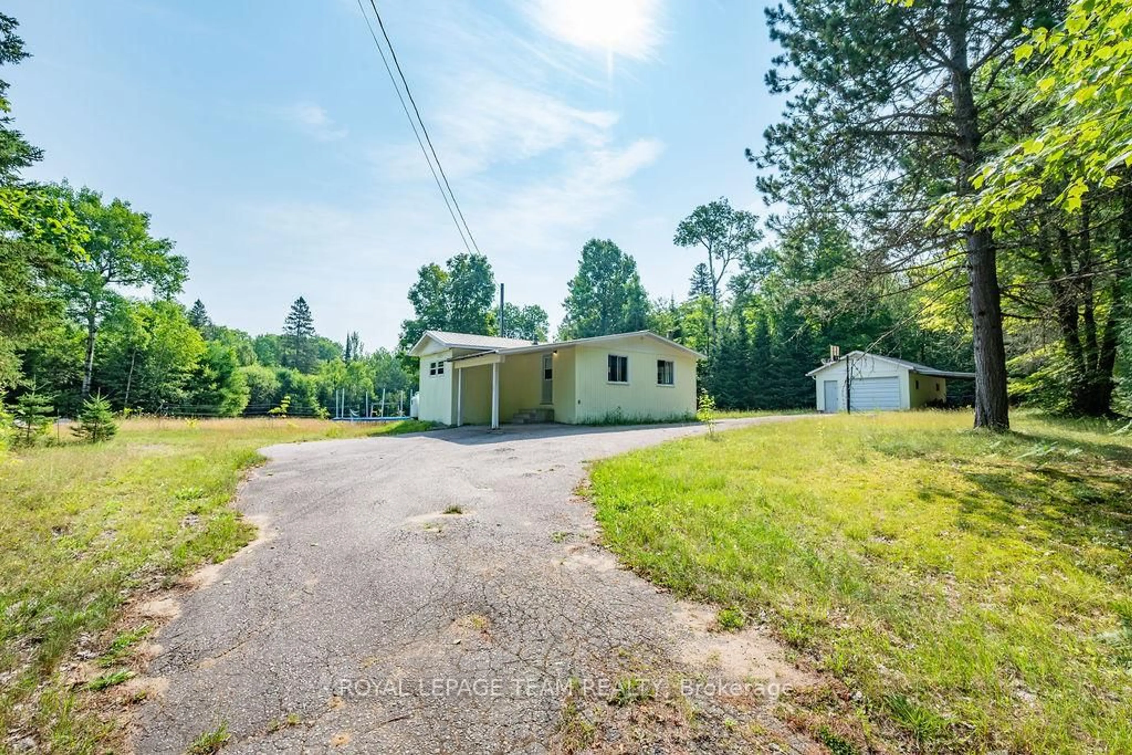 A pic from outside/outdoor area/front of a property/back of a property/a pic from drone, unknown for 7300 Highway #127 Highway, South Algonquin Ontario K0J 2M0