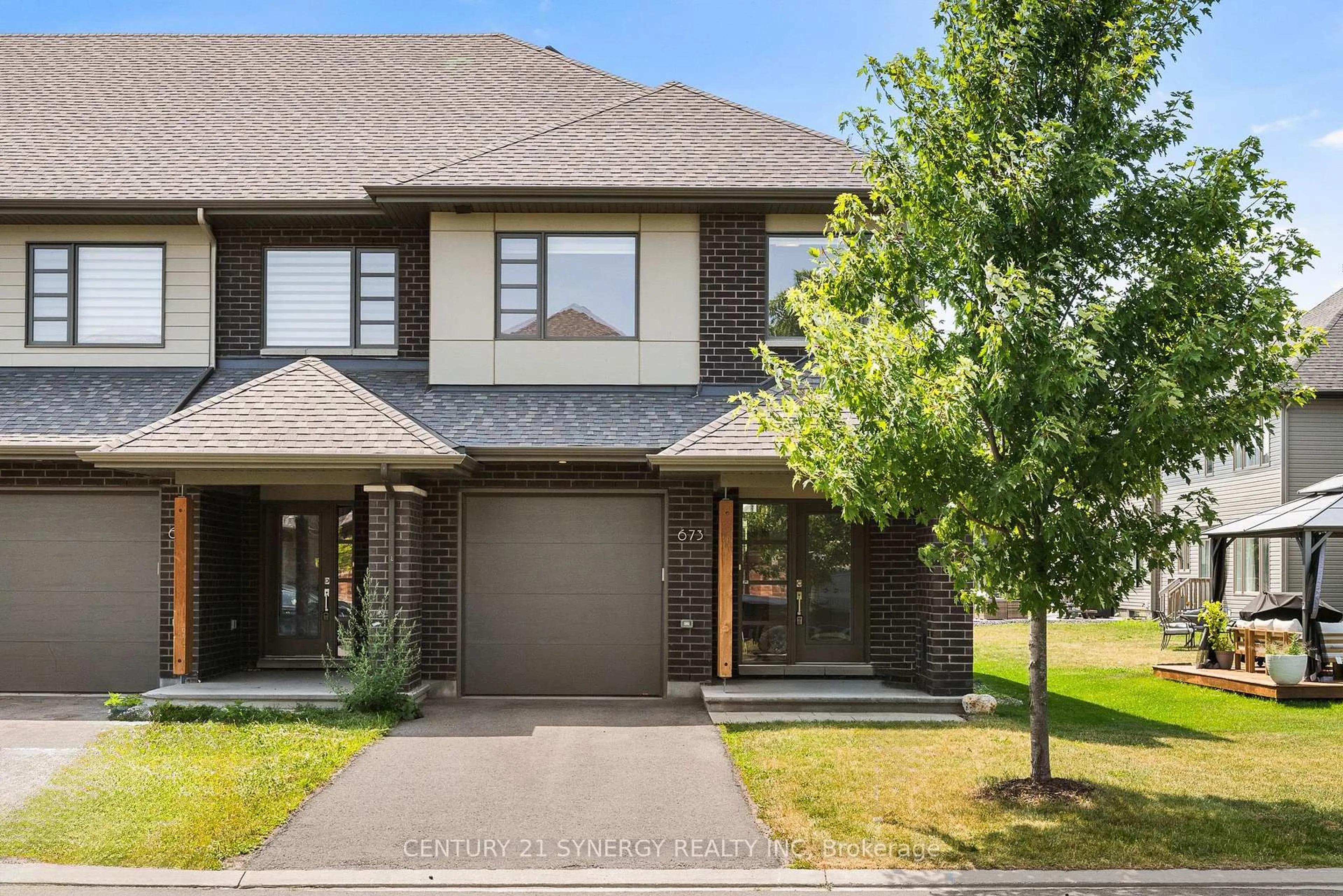 Home with brick exterior material, street for 673 Odyssey Way, Ottawa Ontario K1T 0T3