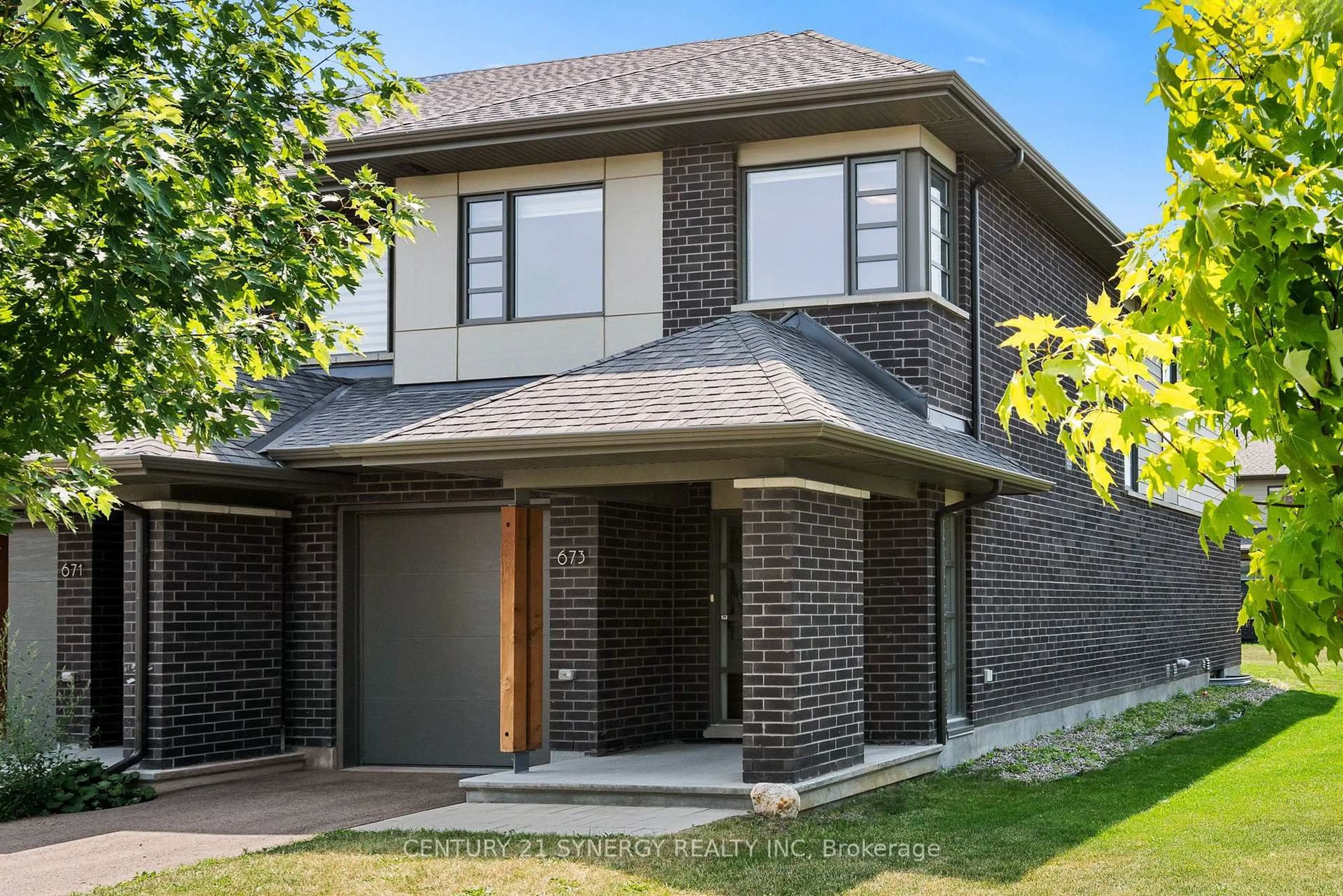 Home with brick exterior material, street for 673 Odyssey Way, Ottawa Ontario K1T 0T3