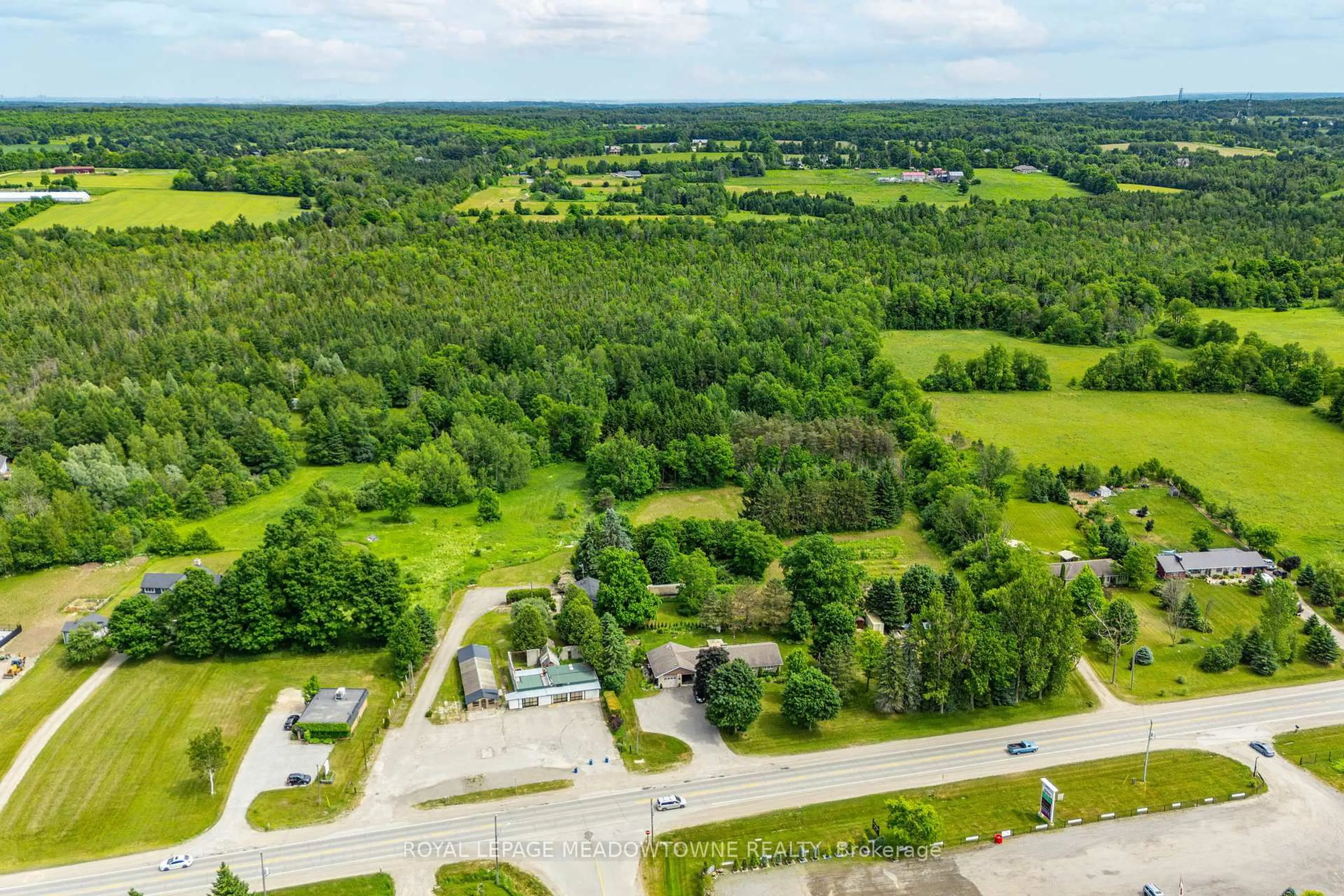 A pic from outside/outdoor area/front of a property/back of a property/a pic from drone, forest/trees view for 9483 Wellington Rd 124, Erin Ontario N0B 1T0