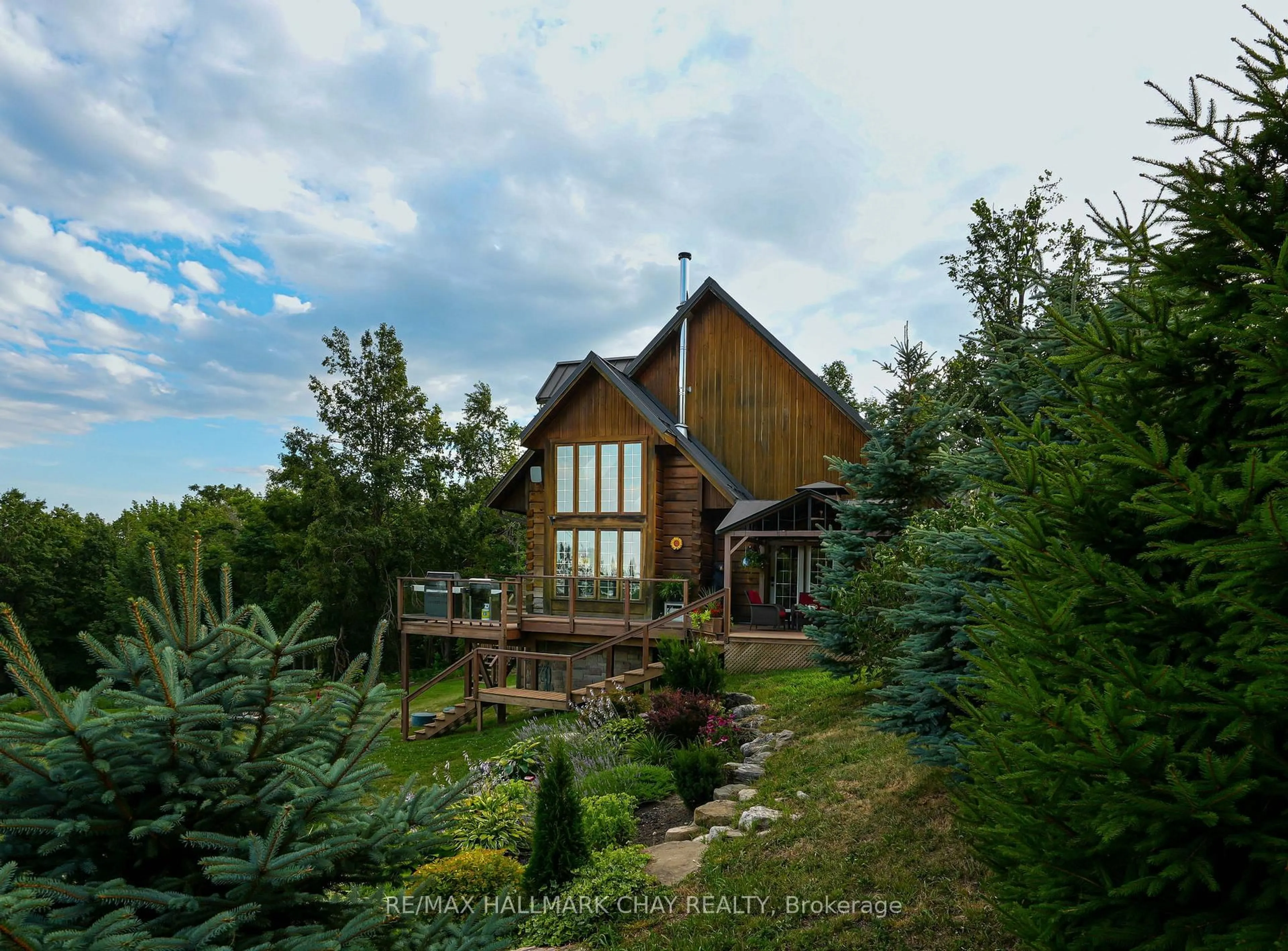 A pic from outside/outdoor area/front of a property/back of a property/a pic from drone, unknown for 707412 County Rd 21 Rd, Mulmur Ontario K8V 5P8