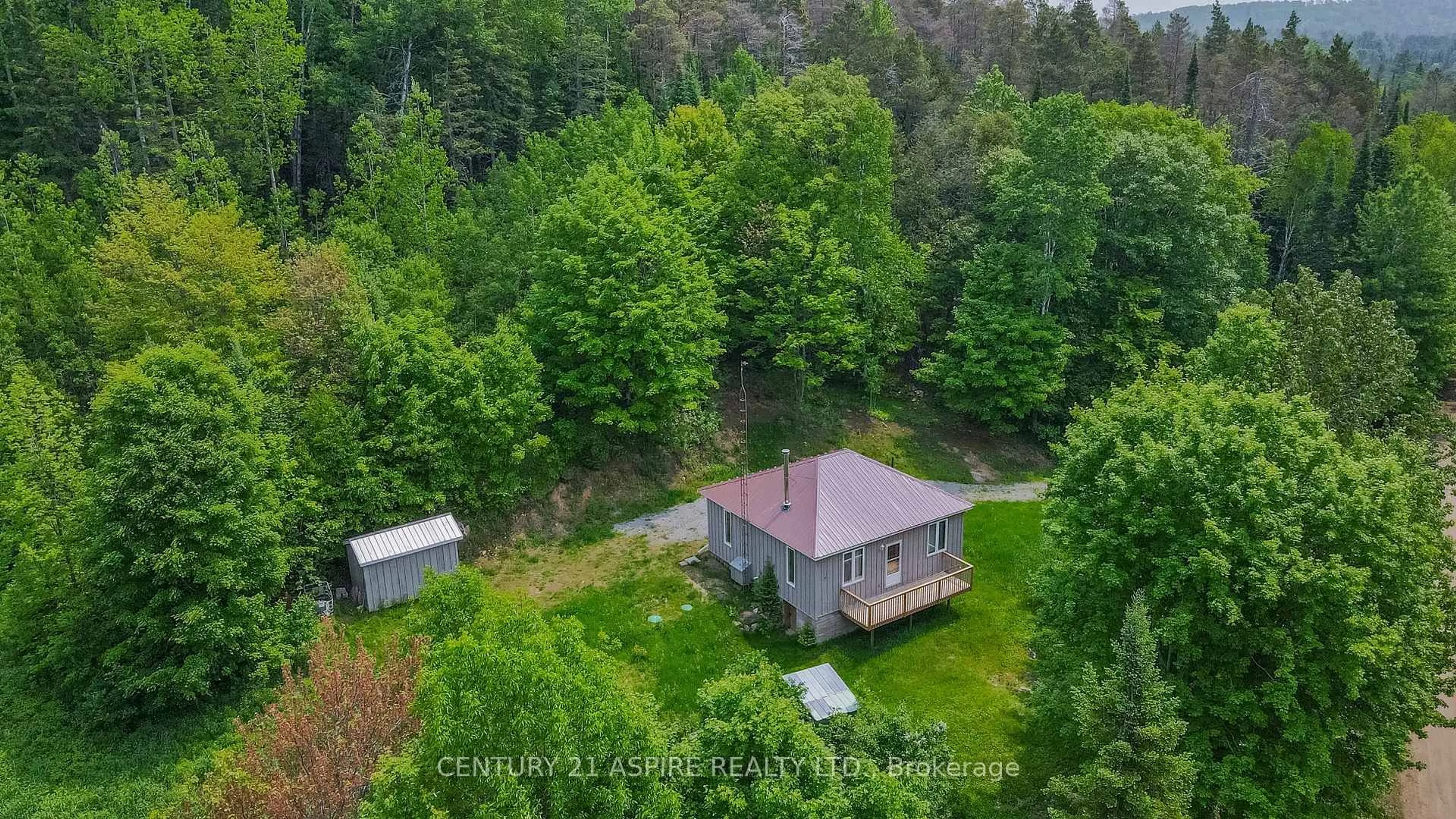 A pic from outside/outdoor area/front of a property/back of a property/a pic from drone, forest/trees view for 117 Craigmont Rd, Combermere Ontario K0J 1L0