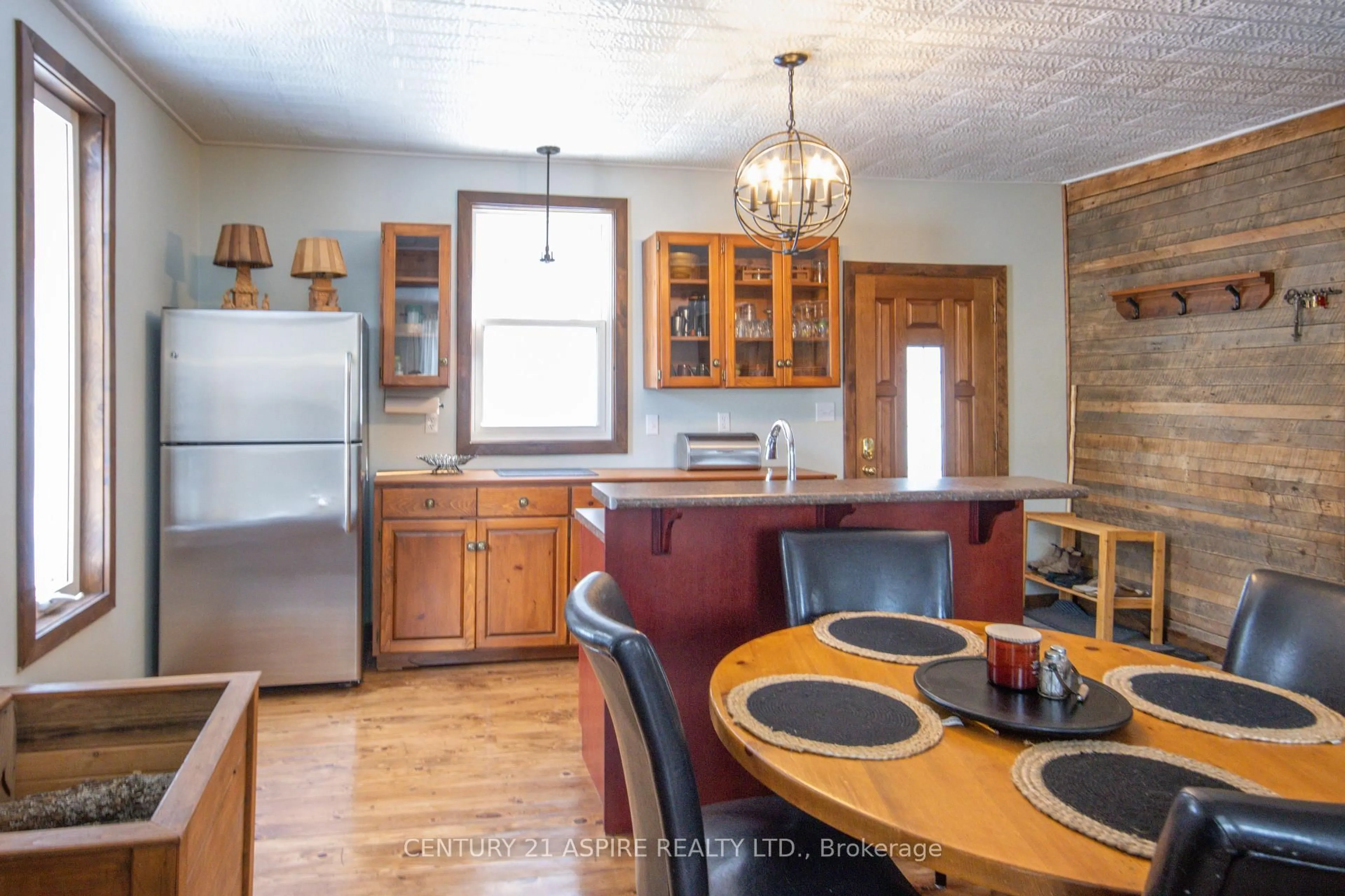 Open concept kitchen, wood/laminate floor for 117 Craigmont Rd, Combermere Ontario K0J 1L0