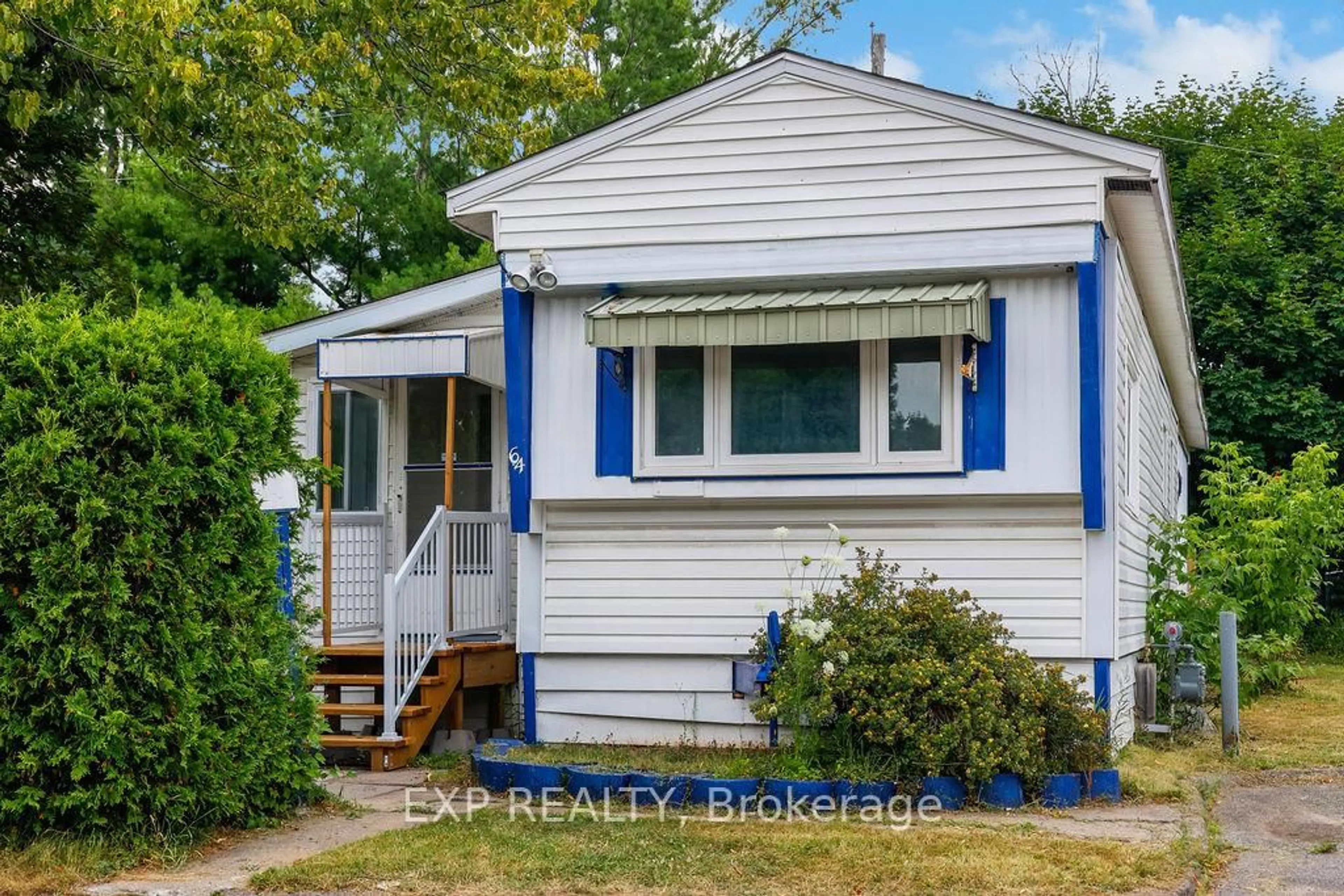 Home with vinyl exterior material, street for 64 Vanier Rd, Ottawa Ontario K2H 7P6