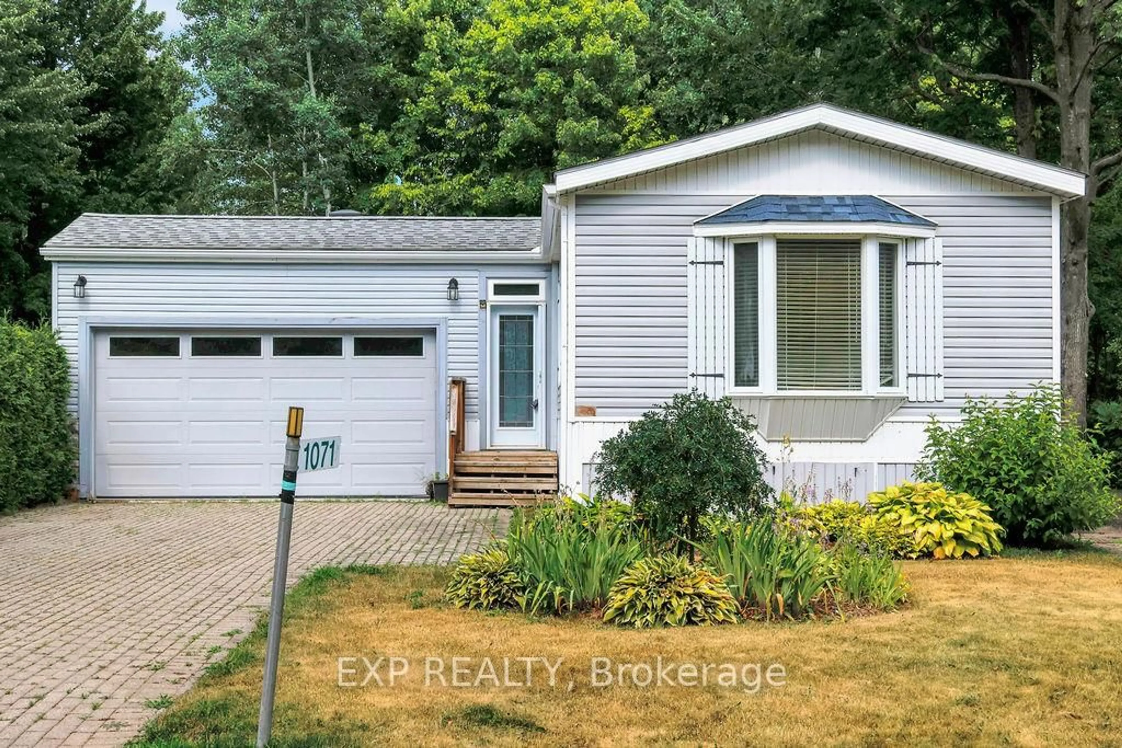 Home with vinyl exterior material, street for 1071 Teena Colleen Private, Greely Ontario K4P 1C7