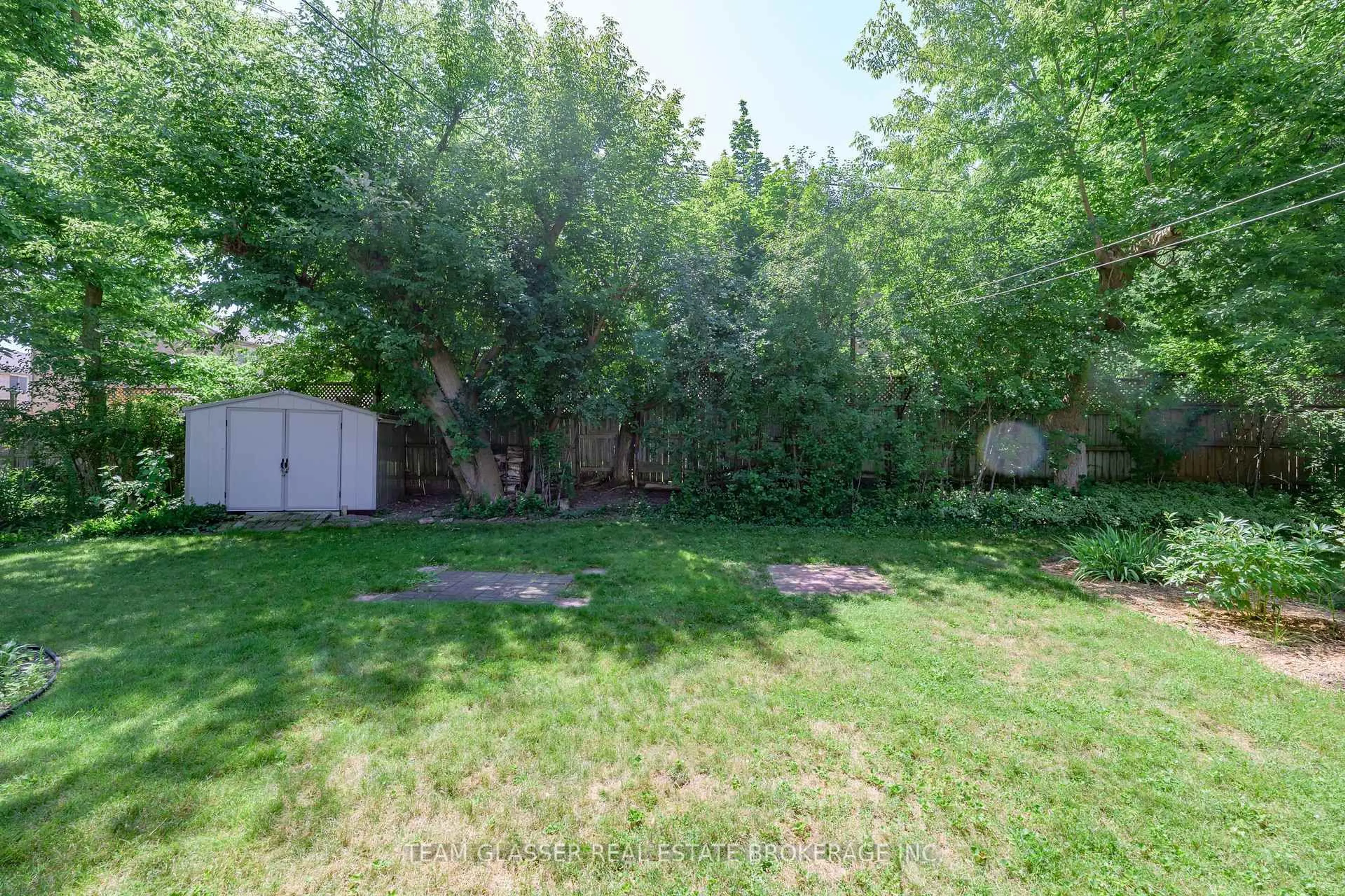A pic from outside/outdoor area/front of a property/back of a property/a pic from drone, forest/trees view for 376 Cedar Ave, London North Ontario N6G 1E7