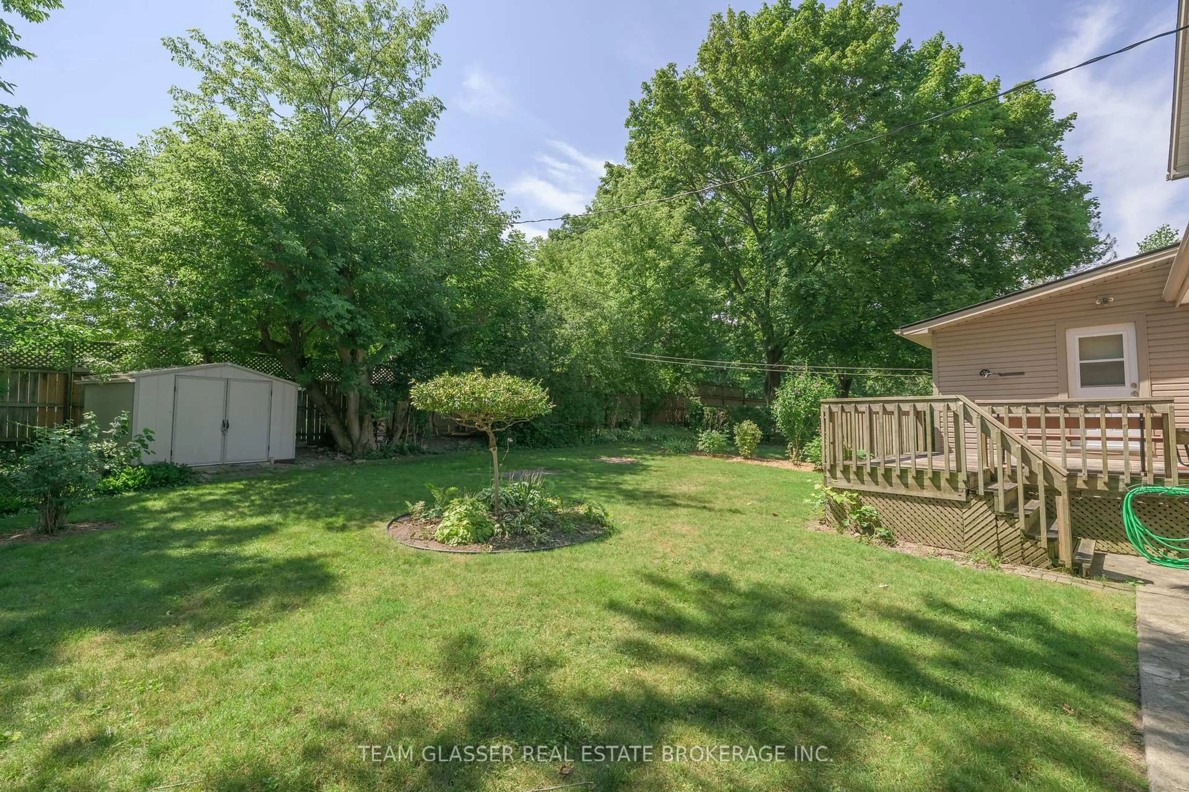 A pic from outside/outdoor area/front of a property/back of a property/a pic from drone, forest/trees view for 376 Cedar Ave, London North Ontario N6G 1E7