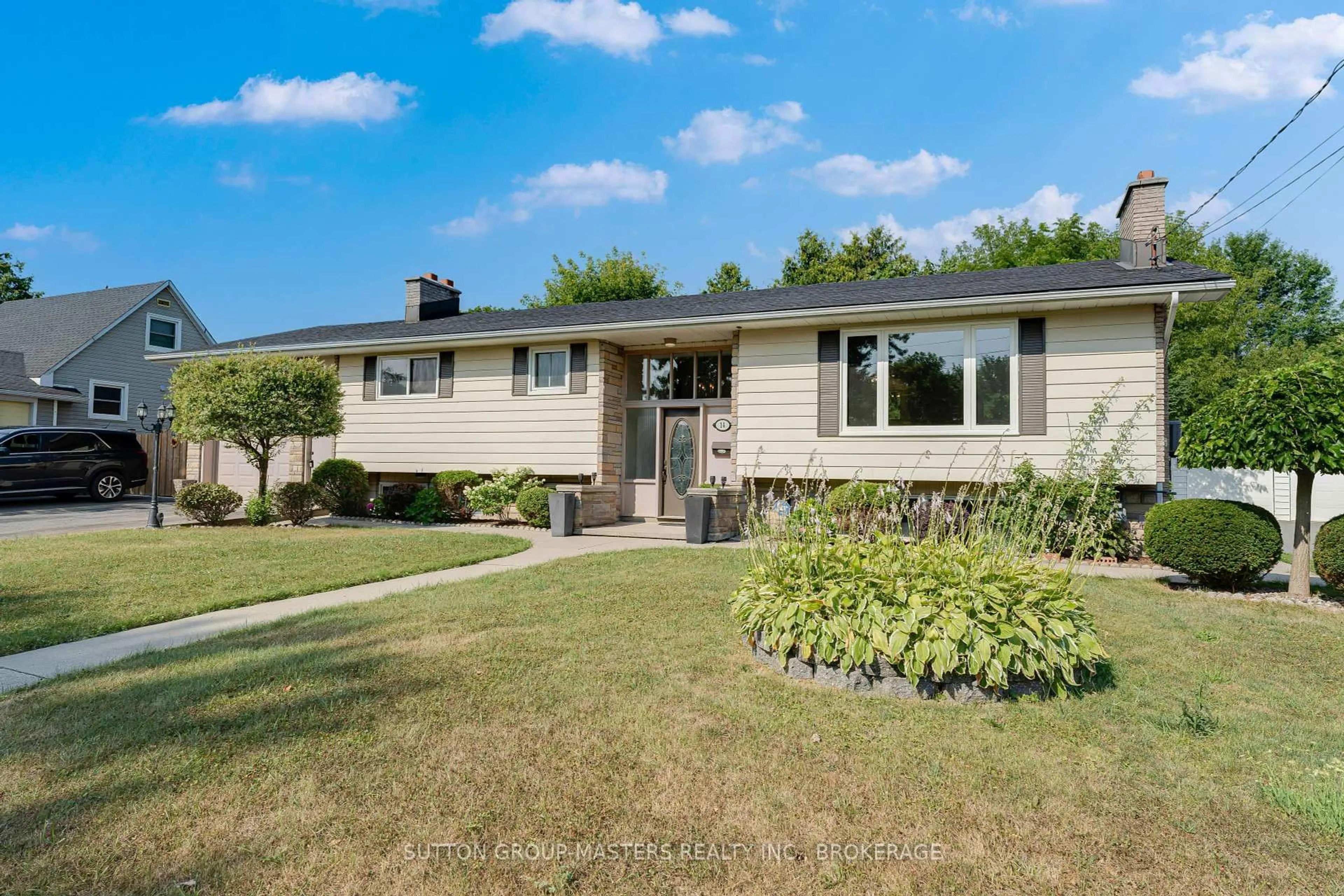 Home with vinyl exterior material, street for 14 Baker St, Kingston Ontario K7K 4Z3
