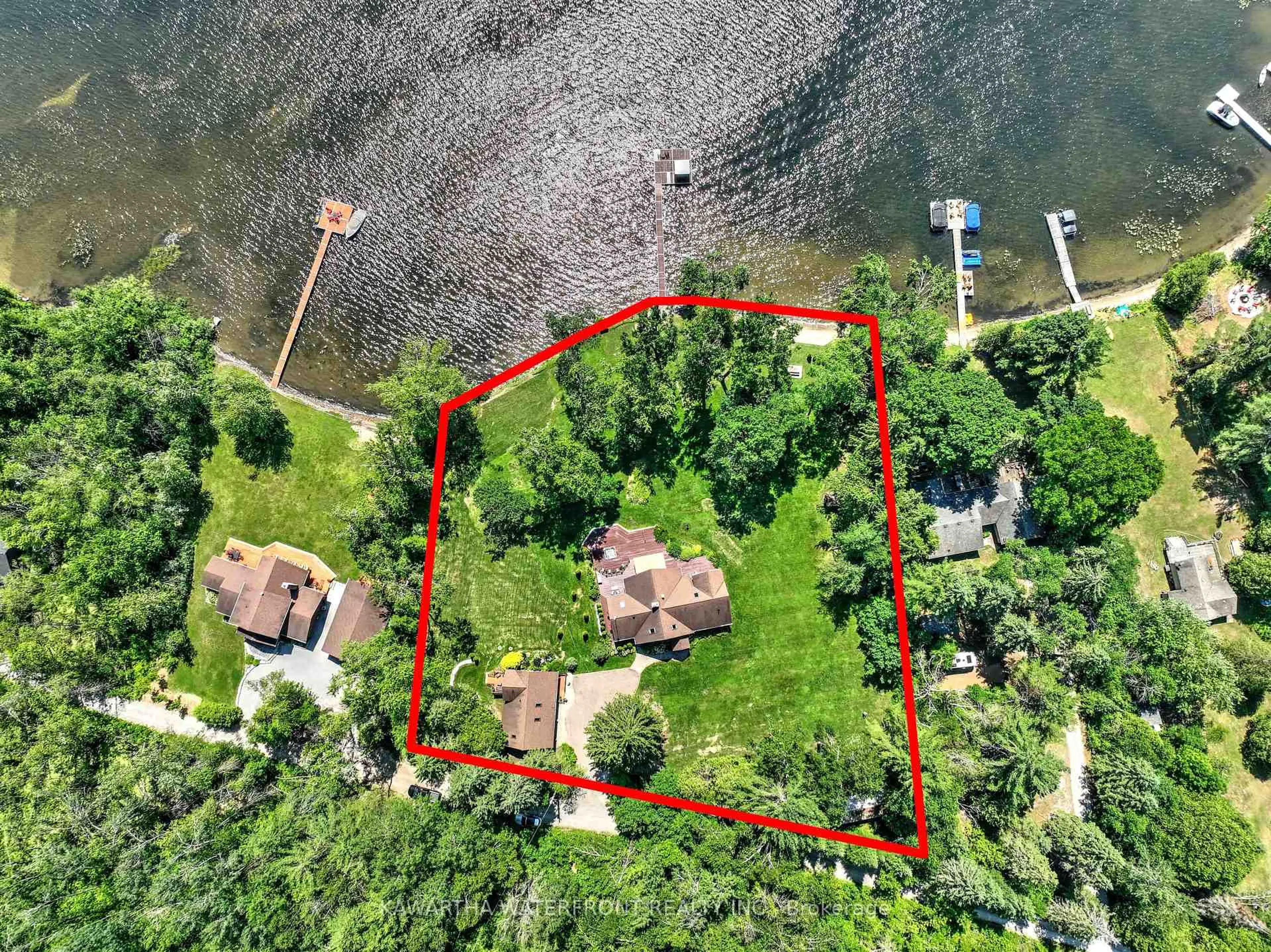 A pic from outside/outdoor area/front of a property/back of a property/a pic from drone, water/lake/river/ocean view for 24 Courtland Rd, Kawartha Lakes Ontario K0M 1K0